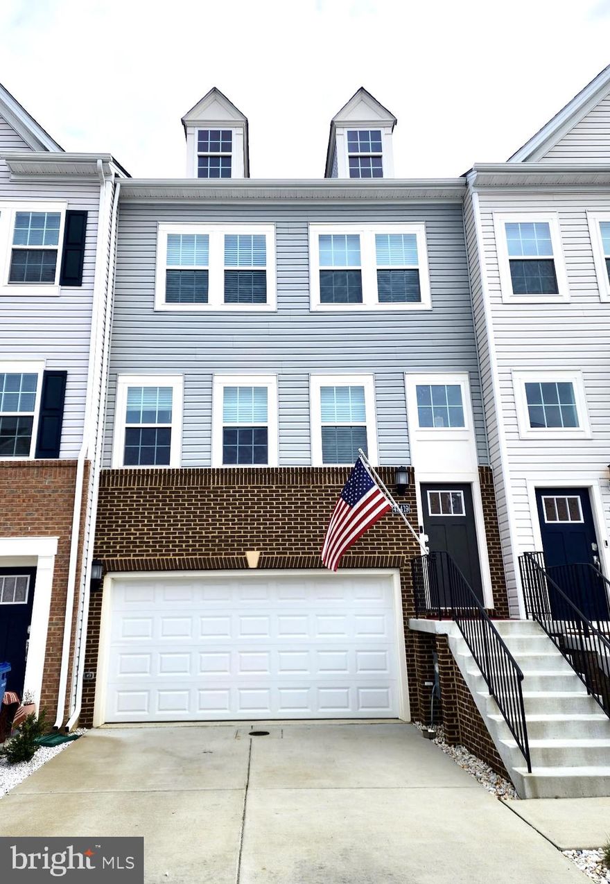 Upgraded finishes, move-in ready, and backing to trees—this beautifully designed townhome offers the perfect blend of style, privacy, and everyday ease, just minutes from PAX River, waterfront access, and a vibrant, family-friendly community.  
Built just 2.5 years ago, this 3-bedroom, 3.5-bath home feels like new construction and features a thoughtfully designed layout with elevated finishes, including crown molding throughout the home. The main (2nd) level showcases a bright, spacious open family room filled with natural light, flowing seamlessly into the dining area and kitchen—ideal for both everyday living and entertaining.
The kitchen is a true centerpiece, featuring quartz countertops, a statement hood, double wall ovens, a 5-burner gas cooktop, and an expansive six-seat island with farmhouse sink.  A custom wet bar and oversized pantry just off the dining area add both function and a refined touch.  Along with half bath on this level.  
The 3rd level offers a well-appointed layout with a spacious primary suite featuring a spa-like bath with upgraded tile, double sink and quartz countertops. Two additional bedrooms and an additional full bath with granite countertops and ceramic tile provide comfort and style, along with the convenience of laundry on this level.
The entry level includes a full bath and flexible bonus space off the garage—perfect for a guest suite, home office/den, or potential 4th bedroom.
Enjoy outdoor living with a newly added paver patio, fully fenced yard, and upper deck with low-maintenance boards and solar lighting—all overlooking a serene, tree-lined backdrop.
Ideally located near shopping, dining, and commuter routes, and just a short drive to local parks, beaches, and boat launches—this home offers easy access to the best of Southern Maryland living.
Community amenities include a pool, playgrounds, and onsite daycare, making this a truly connected and convenient place to call home.