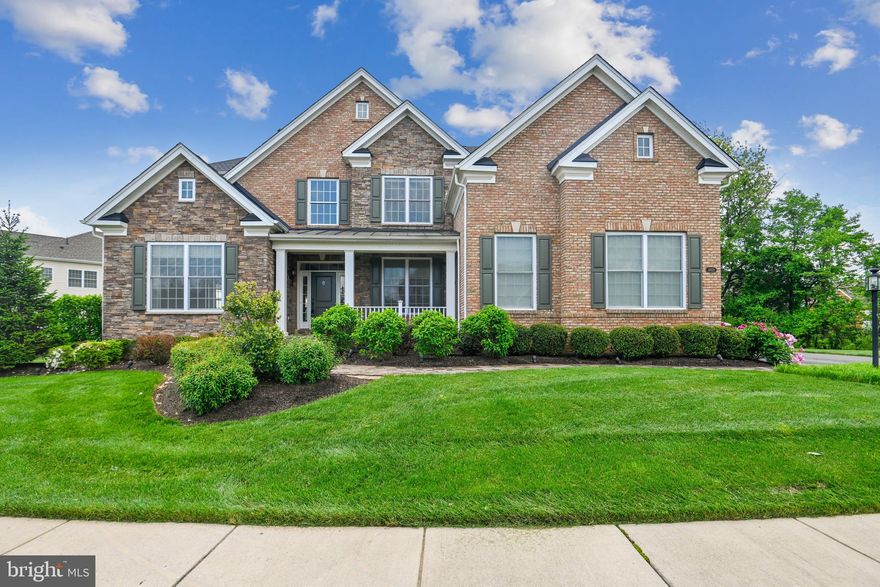 Available for immediate delivery, this beautifully maintained Toll Brothers home was first delivered to the current owners in 2016 and shows like its brand new. The bright freshly painted walls of this 4 bedroom 4 ½ bath gloriously contrast the sun’s light from the deep espresso wood floors throughout the main level’s formal living room, dining room, and open kitchen and family room. Effortlessly opening to the large back deck and tree lined yard with a sprinkler system where you can take in the southern sun and the beauty of your meticulously manicured landscaping or enjoy the fresh air for dining al fresco before returning inside to sit by the fireplace in the family room. The furnished basement with built-in surround sound, wall to wall premium carpeting, and rough-in for a bar allow one of many options for late nights or winter weekends for family and friends to gather comfortably. The full bathroom there also allows options for them to stay longer. The oversized office provides a sanctuary to get work done or to opportunity to customize the space into an amazing game room. The top floor owners’ suite at the front of the house boasts an ample walk-in closet and gorgeous primary bathroom. A secondary bedroom provides for another on-suite resting facility and walk-in closet. The rear bedrooms on the top floor share another full bathroom with the ability to bath privately while someone else can use the dual vanity area at the same time. The laundry room is right there for a short trip from the bedrooms and bathrooms to reset for the week ahead. Ample parking at this beautiful home with the 3-car side-load garage and large driveway allow room for family members, visitors, or even that weekend specialty vehicle that helps you relax and enjoy Loudoun County’s picturesque country roads. Community features include a pool, gym, tennis courts, playgrounds, basketball court, and sports field. Just under 12 miles from Dulles International Airport and 2.4 miles from the nearest Loudoun County Commuter bus to Arlington and Washington, DC.