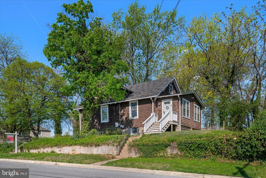 Welcome to this rare opportunity in the Anne Arundel County—where privacy, space, charm, and convenience come together beautifully. Situated on an expansive double lot (Lots 20-22) and Lots 23-25), this property offers a level of outdoor space that’s hard to find—fully fenced and complete with three separate sheds, making it ideal for storage, hobbies, or future creative use. Step inside and you’ll immediately appreciate the perfect blend of original character and thoughtful updates. The home features original hardwood floors that add warmth and timeless appeal, paired with an updated kitchen designed for both functionality and style—offering the ideal space for everyday living and entertaining. With 2 bedrooms and the potential for a 3rd, plus 2 full bathrooms, this home offers flexibility to fit your lifestyle—whether you need a guest room, home office, or additional living space. The flex space provides even more versatility, perfect for today’s work-from-home needs or bonus living area.

Downstairs, the basement workshop is a standout feature—ideal for DIY projects, hobbies, or additional storage, offering a level of functionality rarely found at this price point. In addition, the basement boasts a new water heater (2025) and a newly updated bathroom (2026) Outside, enjoy your own private retreat with plenty of room to entertain, garden, or simply relax—this oversized lot gives you the freedom to create the outdoor space you’ve always wanted. Location is everything—and this one delivers. Conveniently located near major commuter routes including MD-170 (Ritchie Highway), I-695 (Baltimore Beltway), MD-2, and I-895, providing easy access to Baltimore, Fort Meade, and Washington, D.C. MD-170 directly connects Brooklyn Park to BWI Airport and surrounding employment hubs . Enjoy close proximity to top destinations like: BWI Airport, Arundel Mills Mall & Live! Casino, Baltimore Inner Harbor, Fort Meade / NSA, Local parks, waterfront areas, and shopping/dining options. With access to nearby transit options and commuter connections throughout Anne Arundel County, getting around is simple and convenient . If you’ve been searching for space, character, and commuter convenience all in one—this is the one you’ve been waiting for.📍 Schedule your private tour today and see everything this unique property has to offer!