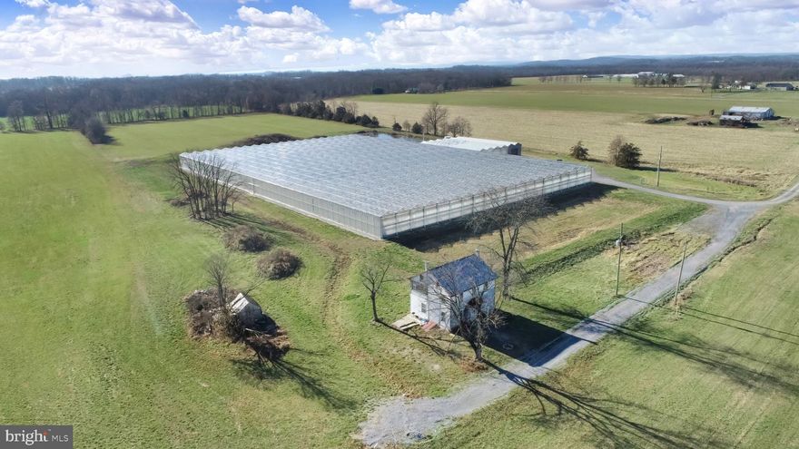 52.48 +/- acre farm with a large greenhouse that was being used for hydroponic cultivation and
processing. Facility was built in 2014 & features 106,000 sq. ft. of greenhouse space and 9,000 square ft. utility area with 400 square ft. cooler room. Greenhouse is constructed of glass with tempered glass roof. Year-round cultivation without artificial lights. Room for facility expansion if new buyer desires. Property was USDA GAP certified when used to grow cucumbers. Property also includes a 3- bedroom
1-bathroom home that needs work with private septic and well and other outbuildings.