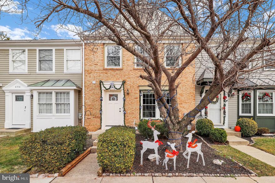 Welcome to this beautifully updated 3 BR/3.5 BA brick-front townhome offering modern finishes, flexible living spaces, and thoughtful upgrades throughout. The table-space kitchen features granite counters, stainless appliances, white cabinetry, and laminate wood-look flooring—ideal for daily living and entertaining. The adjacent dining room offers luxury vinyl plank (LVP) flooring, soft lavender accent walls, and a sliding door to the deck for easy indoor-outdoor flow. The living room continues the LVP flooring and provides a welcoming space to relax. A main-level half bath includes a marble vanity. The walk-out lower level adds valuable living space with LVP flooring on the stairs and in the recreation room, a brand-new door to the deck landing, and a full bath with tub/shower. The utility laundry room includes a washer, dryer, laundry sink, hot water heater, and HVAC and a newer roof was installed in 2020. Upstairs, the primary BR also features LVP flooring, a vaulted ceiling with decorative shelf, a walk-in closet, and an updated en-suite bath (2021) with marble-surround shower, porcelain tile floor, and attractive vanity. Two additional BRs offer LVP floors and vaulted ceilings. The full hall bath includes ceramic tile flooring, a ceramic tile tub/shower surround, and a nice vanity. New plumbing in bathrooms, a new toilet trap in the primary bath, and updated light switches and outlets complete this move-in-ready home. Close to shopping, dining, groceries, and recreation. ***MORTGAGE SAVINGS MAY BE AVAILABLE FOR BUYERS OF THIS LISTING.***