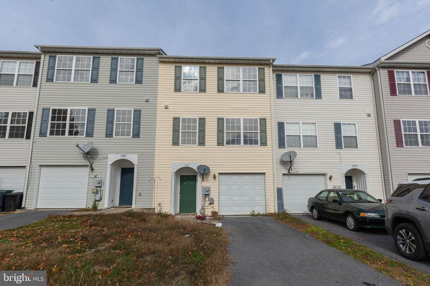 You're welcomed into the home through the lower level -  finished with access to the one car garage, rec/office space, full sized washer and dryer, and half bath.

As you go upstairs to the main level you will be greeted by the naturally lit open floor plan with living room, additional half bath, and combination kitchen/dining room with view of the unfenced rear yard.

The upper level also has the primary suite with full bath and two closets, additional full bath, and two bedrooms.

The Mills Farm Community offers residence tot lots, playground, and is conveniently located between Martinsburg and Inwood for easy access to commuter routes 11 and I-81.

No Pets.

Additional monthly costs include Renter's insurance (price based on plan selection) and Second Nature Air Filter Subscription program ($15.00/ month).