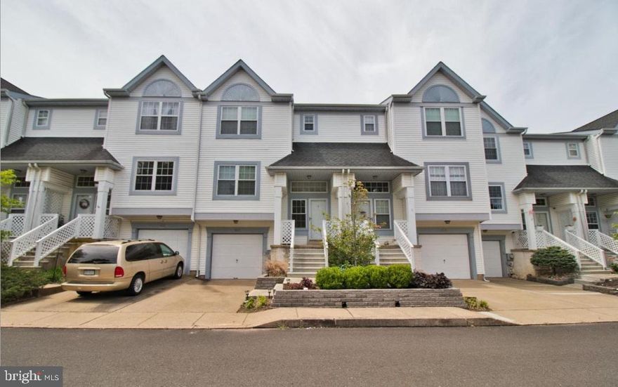 Beautiful move in condition townhouse in Gwynedd Pointe.  Walking distance to  shopping, banks and restaurants.  Close to schools and parks.  Eat in kitchen with plenty of cabinets and counter space.  Living room/dining room combination with hardwood floors and a marble wood fireplace.  5 year old carpets on steps and all three bedrooms.  Master bedroom with walk in closet and master bathroom.  Full finished walk out basement to a private patio.  Storage room in basement and acess to the garage.