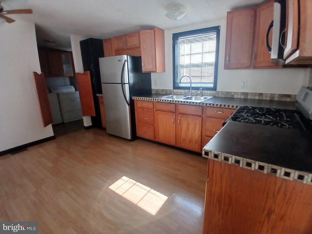 Photo of 71 Lake Drive, MIDDLETOWN, PA 17057 (MLS # PADA2051046)