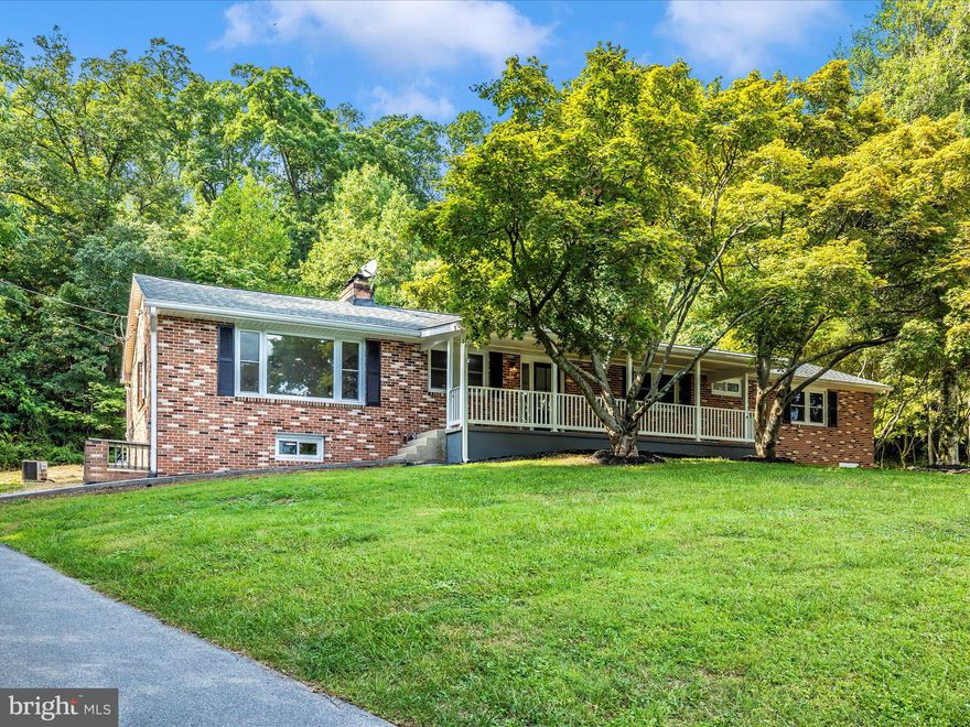 Just $197 a sq ft! Exceptional single family all brick home situated on 1.27 acres, completely remodeled in 2024, including a brand new architectural roof. This 2800+ sq ft home is peaceful, private and serene. Natural light fills this spacious and bright 4 bedroom 2 bath home. This property feels private and remote but is minutes from Downtown Frederick, MARC trains, and major highways. Ornamental trees surround the property. It has a wrap-around driveway and a HUGE covered front porch. There's plenty of room for a large outbuilding and the backyard is a blank canvas waiting for your personal touch. Two wood burning fireplaces perfect for a cozy winter day. Updates include: New roof, New LVT throughout home, Recessed lighting, Remodeled bathrooms, Quartz countertops, Stainless appliances, all new paint throughout, Electrical and plumbing upgrades, Septic and well updated, New stamped concrete patio and sidewalk, upgraded vinyl windows, and more! Award winning OAKDALE SCHOOLS. NO CITY TAXES, OR HOA's.