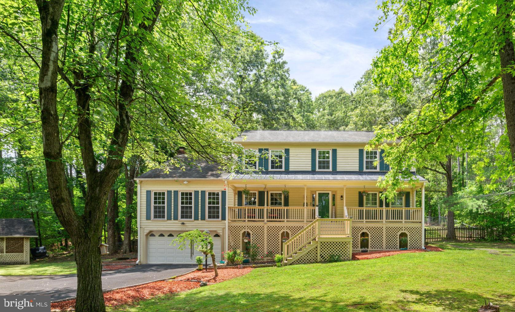 Tucked on a peaceful stretch of land just minutes from nature trails, commuter routes, and the Brooke Station VRE, this spacious home offers sought after flexibility and features. With luxurious indoor living space, a fully finished in-law suite, and a custom outdoor area built for making memories on 5 acres, it’s the kind of place you’ll be proud to call Home.
A covered front porch welcomes you, while inside, the main level impresses with hardwood floors, crown molding, and flexible formal spaces. There’s a dedicated office, a living room with pocket doors, and a bright dining room with a bay window and more pocket doors so you can customize flow and privacy. The inviting kitchen features granite countertops and stainless appliances including an electric glass cooktop and a wall oven. The tray ceiling and oversized windows overlooking the private backyard add to the bright, airy feel. It opens to a casual dining area that walks right out to the back deck.
The family room is huge—featuring a brick wood-burning fireplace and French doors to a large screened-in deck that’s just right for summer evenings spent watching fireflies. This space feels like the perfect retreat with views across your private acreage and the pool area.
Upstairs, the primary suite offers the relaxation you’ve been dreaming of: a full sitting room, walk-in closet, and a spacious en suite with a jetted soaking tub, walk-in shower, and dual vanity. Three additional bedrooms offer plenty of elbow room and ample closet space, and they share a well-appointed hall bath with a large walk-in shower.
The lower level is a true bonus: fully finished with its own full kitchen with granite counters, dining area, living room, bathroom, and 2 bedrooms. There’s even a second laundry hook-up—perfect for multigenerational living, long-term guests, or just extra breathing room.
Step outside and fall in love with the ultimate backyard built for fun and lasting memories. A spacious custom deck overlooks a sparkling in-ground pool—perfect for sunny afternoons and weekend pool parties. The charming gazebo offers a shady spot to relax, play games, or enjoy snacks between swims. Surrounded by peaceful wooded views, this private outdoor haven is ideal for everything from lively celebrations to quiet moments with loved ones.
Additional highlights include a detached garage for your mower and pool gear, and an attached 2-car garage. This home is in a fabulous location: just up the road from the Stafford Civil War Park, 3 minutes to the Brooke VRE, about 5 minutes to Crow’s Nest Natural Area Preserve with 9 miles of trails and canoe/kayak access, and 10 minutes to I-95 and commuter lots.
Lots of space, unbeatable location, and versatility with a backyard paradise- this home has it all!
Some photos have been virtually staged to help illustrate the size, potential use and layout of the spaces.