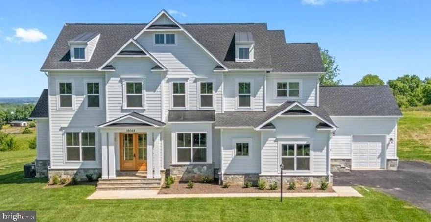 IMMEDIATE DELIVERY HOME!  Within minutes of historic downtown Leesburg.  Main Tree Farm is the best of both worlds - idyllic western Loudoun home with panoramic views,  yet close to it all.  Quality new home construction without the wait. This Huntwick Place has 5 bedrooms, 5 1/2 baths, including a main level guest suite.  Plus, an oak staircase, beamed ceiling in the kitchen, coffered ceiling in the family room, double mahogany front doors, three car garage,  finished basement, Trex deck and a front stone watertable with flagstone steps.  Many more upgraded features!

Visit our DECORATED MODEL HOMES AND SALES OFFICE-16670  & 16658 Huntwick Place, Hamilton , VA 20158. Directions from Leesburg: Route 7 west to Hamilton Station Rd exit. Turn right on Hamilton Station Rd. Right on Colonial Hwy. Right on Ivandale St. and proceed under Rte 7. Ivandale Farm is on the right near the intersection of Ivandale Rd. and Piggott Bottom Rd. Open  Daily 10-5.

HOA fees are estimates
Features, square footage, beds & baths are per base floor plans.