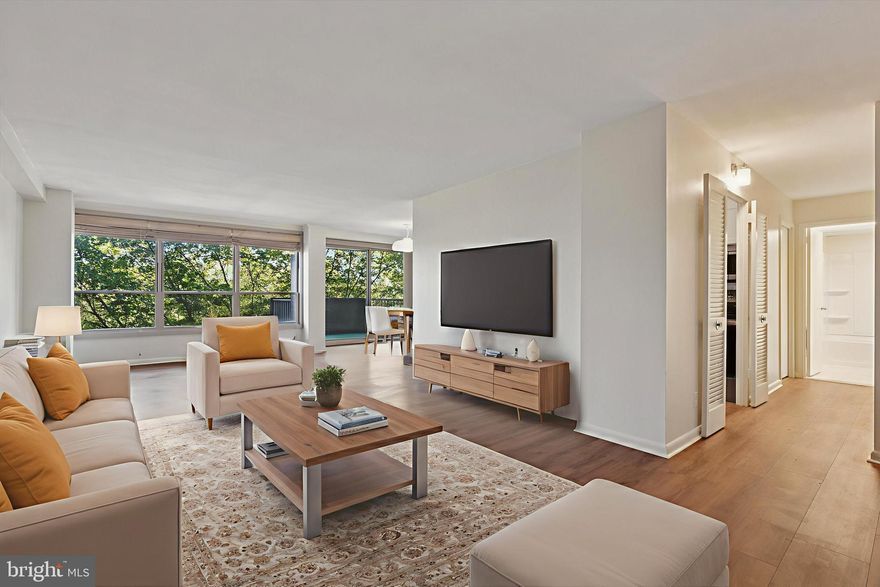 Enjoy the feeling of residential living with a resort feel in the heart of the main line and centrally located. Situated on 23 wooded and landscaped acres with lots of trees, it feels like a private oasis! You'll be impressed with a long list of ammenities as well. Inside unit 801 you'll be greeted by newly installed luxury plank flooring throughout the unit, wall to wall windows with views of trees and the outdoor pool in a spacious, open, light-filled space. Fresh paint in light neutral shade throughout, just bring your furniture and decor and settle in! This unit has been meticulously renovated to be clean, fresh and modern. The galley-style kitchen has been outfitted with new, crisp white cabinets, beautiful countertops and a stunning subway style backsplash. A new stove has also been added and the refrigerator is included. The bedroom is spacious with one large window wall and great views. A new bathroom awaits as well in bright white and ready for your personal touches.   Washer and dryer are included with the unit as well as new roman shades in the living area and vertical blinds in the bedroom. Outside enjoy your balcony sights and sounds and the fresh breeze.  The list of ammenities is a long one. 24 hours security, outdoor swim club ( fee required), fitness center with indoor pool ( fee required),tennis courts, game room, playground,library, banquet rooms available for rental fee,free shuttle, storage lockers and more. This unit comes with an 8'x8' private storage space located in the basement, ample free parking. All this awaits in a centrally located space close to main roads, highways, hospitals, schools, shopping, restaurants and more. The monthly condo fee covers all utilities except cable.