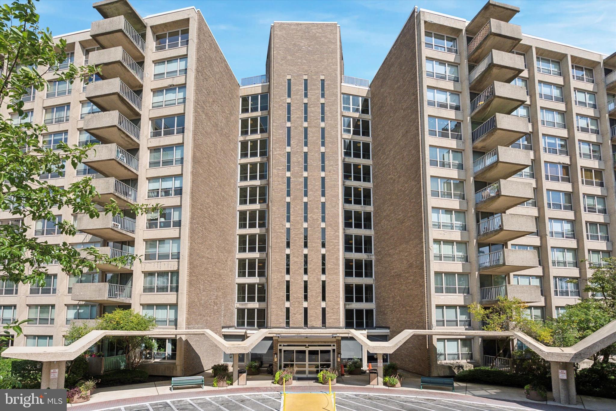 Enjoy the feeling of residential living with a resort feel in the heart of the main line and centrally located. Situated on 23 wooded and landscaped acres with lots of trees, it feels like a private oasis! You'll be impressed with a long list of ammenities as well. Inside unit 801 you'll be greeted by newly installed luxury plank flooring throughout the unit, wall to wall windows with views of trees and the outdoor pool in a spacious, open, light-filled space. Fresh paint in light neutral shade throughout, just bring your furniture and decor and settle in! This unit has been meticulously renovated to be clean, fresh and modern. The galley-style kitchen has been outfitted with new, crisp white cabinets, beautiful countertops and a stunning subway style backsplash. A new stove has also been added and the refrigerator is included. The bedroom is spacious with one large window wall and great views. A new bathroom awaits as well in bright white and ready for your personal touches. Washer and dryer are included with the unit as well as new roman shades in the living area and vertical blinds in the bedroom. Outside enjoy your balcony sights and sounds and the fresh breeze. The list of ammenities is a long one. 24 hours security, outdoor swim club ( fee required), fitness center with indoor pool ( fee required),tennis courts, game room, playground,library, banquet rooms available for rental fee,free shuttle, storage lockers and more. This unit comes with an 8'x8' private storage space located in the basement, ample free parking. All this awaits in a centrally located space close to main roads, highways, hospitals, schools, shopping, restaurants and more. The monthly condo fee covers all utilities except cable.