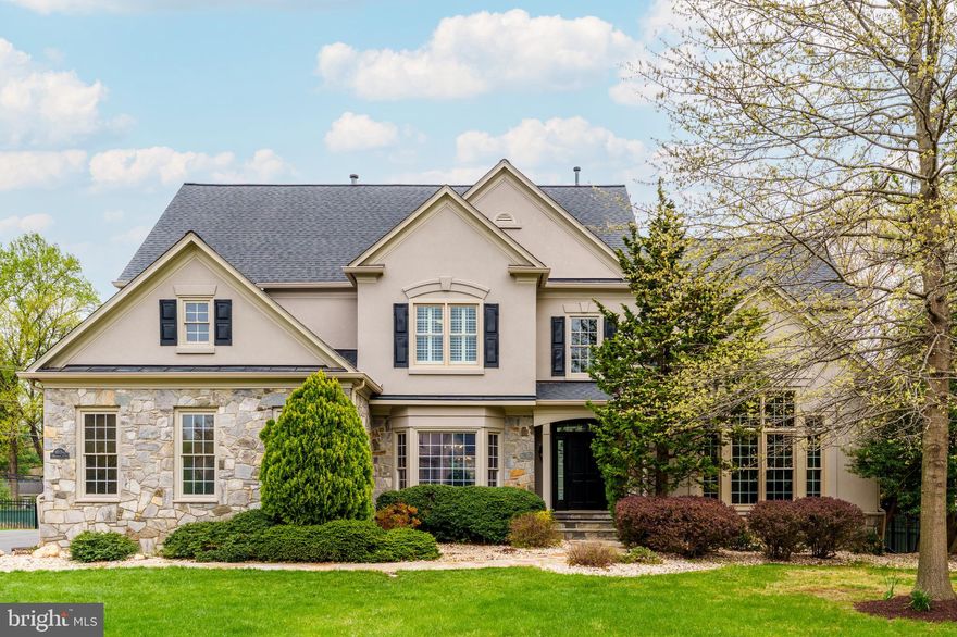 Located in the highly sought-after McLean Hundred neighborhood, this elegant home offers the perfect blend of luxury, comfort, and convenience. With easy access to major commuter routes, Tysons Corner, downtown McLean, and a wealth of shopping and dining options, the location is ideal for modern living within the Langley HS, Cooper MS, and Spring ES school pyramid.

Set on a .62 acre lot on a private street with a spacious front yard, the home’s exterior features a sprinkler system, expansive deck, and beautiful stone paver patio. An attached side-entry three-car garage with soaring ceilings offers ample storage and functionality.

Inside the  7,150 square foot home you will find high ceilings, abundant natural light, crown and chair moldings, and elegant details.  A dramatic two-story foyer with chandelier and hardwood floors sets the tone.  Adjacent to the foyer are a dining room and an oversized office featuring hardwood floors and coffered ceiling. A two-story family room provides hardwood floors, gas fireplace, and doors to the back yard. The gourmet kitchen is complete with granite countertops, a center island, ceramic tile flooring, walk-in pantry, and stainless steel appliances including a double oven, gas cooktop, dishwasher, and built-in microwave.  Adjacent is a charming breakfast/sitting room combination with a vaulted ceiling, fireplace, and built-in desk area.  On the way to the three car garage is a convenient mudroom with a closet and separate laundry room with cabinets and a utility sink.

The spacious main-level primary bedroom includes hardwood floors, tray ceiling, fireplace, and direct access to the rear deck. The en-suite primary bath includes two walk-in closets, a soaking tub, separate shower, and dual vanities. Upstairs you will find four large bedrooms with generous natural light and walk-in closets. Two of the bedrooms feature private en-suite baths, while the remaining share a Jack and Jill bathroom with dual sinks.

The finished lower level offers an expansive recreation room perfect for entertaining, a bonus room with a walk-in closet and direct access to a full bathroom, a dedicated gym with rubber flooring and mirrored walls, and a large storage area.

The home is equipped with two HVAC systems for year-round comfort, and is serviced by natural gas, public water, and public sewer. Every detail of this beautifully maintained property has been thoughtfully designed for comfortable living and gracious entertaining.