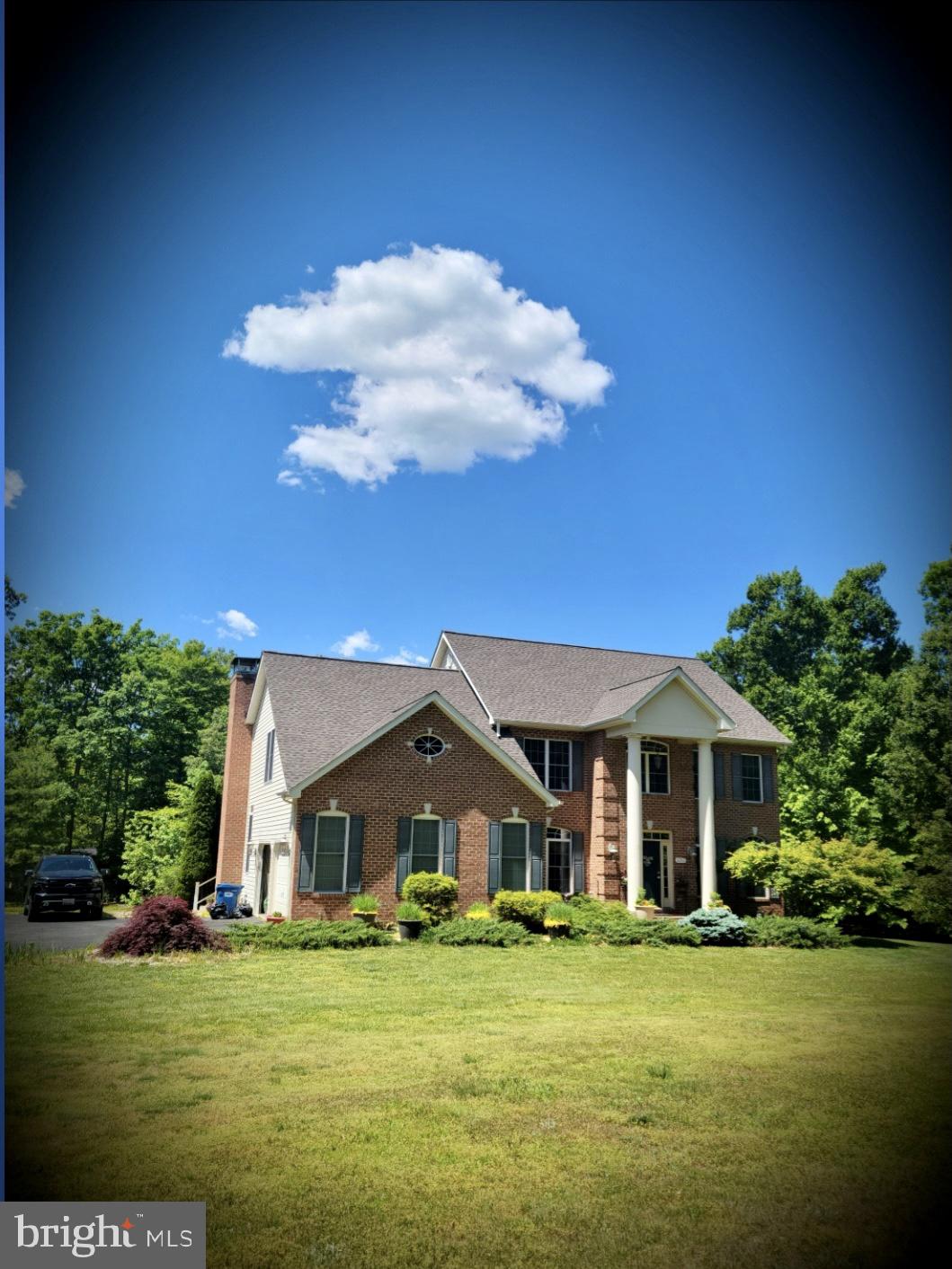 Absolutely gorgeous HOME on 4 acre lot. Stunning and mature landscape. 2 tear trex deck with remote operating awning overlooking beautiful yard. Hot tub. 2 car side entrance garage. 4 bedrooms, 3.5 baths. The kitchen boasts granite counters, tile backsplash, kitchen island, and pantry and new appliances. 2 story family room with cozy fireplace and stone wall. Formal dining room with bay window and office/flex space with built in cabinetry . Master bedroom has a sitting room, soaking tub, step in shower, double sinks with quartz countertop , 2 walk in closets. Princess suite offers great size bedroom with attached bath. 2 more bedrooms with Jack and Jill bath. Laundry on upper level. Huge unfinished basement has a bathroom rough in, double door outside entrance and full size windows . Dual HVAC. One of the units was just replaced and the other one couple years ago. Brand new roof, washer and dryer, all new appliances and ceiling fans and much more. Storage shed 12 x 24 with attic storage. Must See!!!!