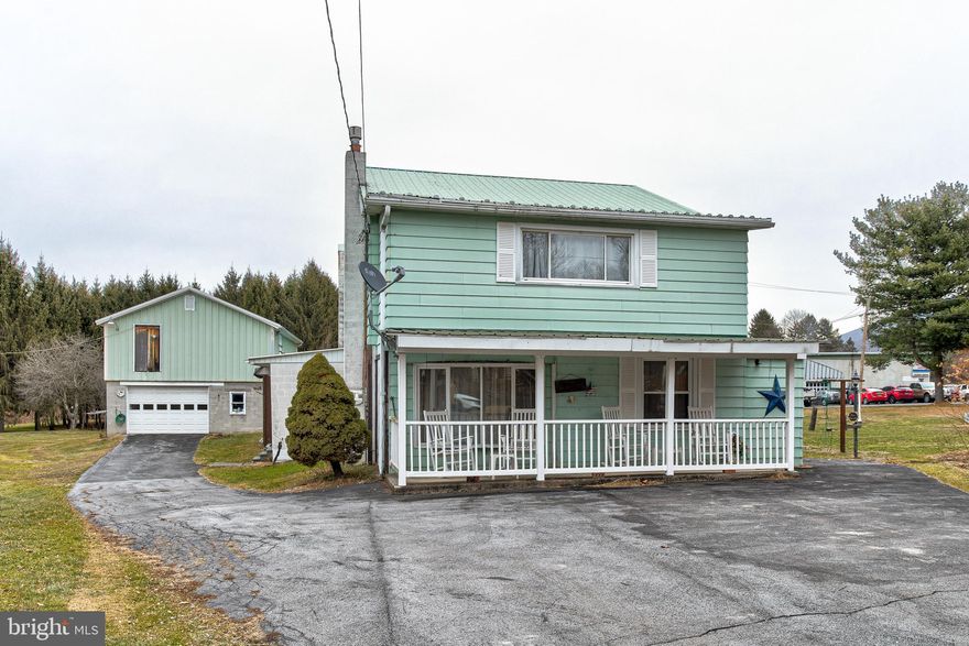 Endless possibilities await with this unique, multi-use property located in Castanea. The main residence is a two-story home offering 2,872 finished square feet, featuring 3 bedrooms and 2 full bathrooms. The current layout allows for a potential in-law suite, with kitchens located on both the first and second floors.

The first floor includes one bedroom, one full bathroom, and a spacious kitchen and dining area that flows seamlessly into the living room. The living room is highlighted by a bay window and a gas fireplace.  At the rear of the home, a fully enclosed porch with a wood fireplace provides direct access to the in-ground pool, creating an ideal space for relaxation or entertaining. 

The second floor offers two generously sized bedrooms, a full bathroom, and a full kitchen. It can be accessed from the main level, allowing for flexible use as either a single residence or two separate living areas. 

The property also includes a detached 40' x 24' two-car garage with electricity and a second-floor workshop. Additionally, there is a one-story building formerly used as a butcher shop, formerly known as the “Meat Grinder,” offering 2,328 square feet of additional space and potential.

The land itself is equally impressive, featuring a 2.14-acre lot that borders Bald Eagle Creek with over 400 feet of creek frontage. Two pavilions are also located on the property. In total, five parcels are included in the sale, comprising approximately 3.34 acres.