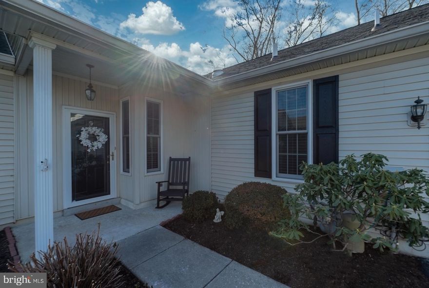 This beautifully upgraded townhome at 21 Hunters Way offers a thoughtful blend of timeless finishes and modern improvements throughout.   Tucked away on one of the most secluded lots in Fox Hill Farm.  Semi private lot that backs up to pine trees and the walking trail.   The outside of the home was refreshed with new shutters and new storm door.  Extensive perennial landscaping that adds seasonal color and charm.  Inside, the home features hardwood flooring and plantation shutters, creating a warm and cohesive look across the entire townhome.  The updated kitchen is both stylish and functional, showcasing quartz countertops, a Carrera marble backsplash, painted cabinetry with added molding and new hardware.  Updated faucet, and modern lighting -- perfect for everyday living and entertaining.  Enjoy morning coffee on the screened in patio and enjoy the change of seasons in your backyard.   The den is bright with  custom Plantation Shutters and a new ceiling fan for added comfort.  
The home includes 2 renovated bathrooms, each finished with quality materials.  The hall bath features a marble floor, quartz countertop, updated fixtures, lighting, painted cabinetry with new hardware & new baseboards.  The primary bathroom is a true highlight, offering a quartzite countertop, heated flooring, updated fixtures and hardware in the shower and vanity.  Crown molding, fresh painted cabinetry , new baseboards, and updated lighting -- creating a spa-like retreat.  Additional improvements include an updated laundry room with new flooring, baseboards, painted cabinetry with new hardware and molding, louvered doors, and updated lighting.   The primary suite and guest bedroom are spacious with ample closet space.  Major systems provide peace of mind, with windows, heating, air conditioning, and appliances previously replaced, along with a new hot water heater.
Move-in ready and stylishly upgraded, this townhome is the perfect blend of comfort and privacy.
Life at Fox Hill Farm is all about enjoyment and convenience.  Residents have access to resort-style amenities including a clubhouse, indoor & outdoor pools, fitness center.    Simply unpack and enjoy the vibrant, amenity-rich lifestyle this active adult community has to offer.  Please see the attached list of upgrades along with the seller's property disclosure.
Owner prefers a late March closing.