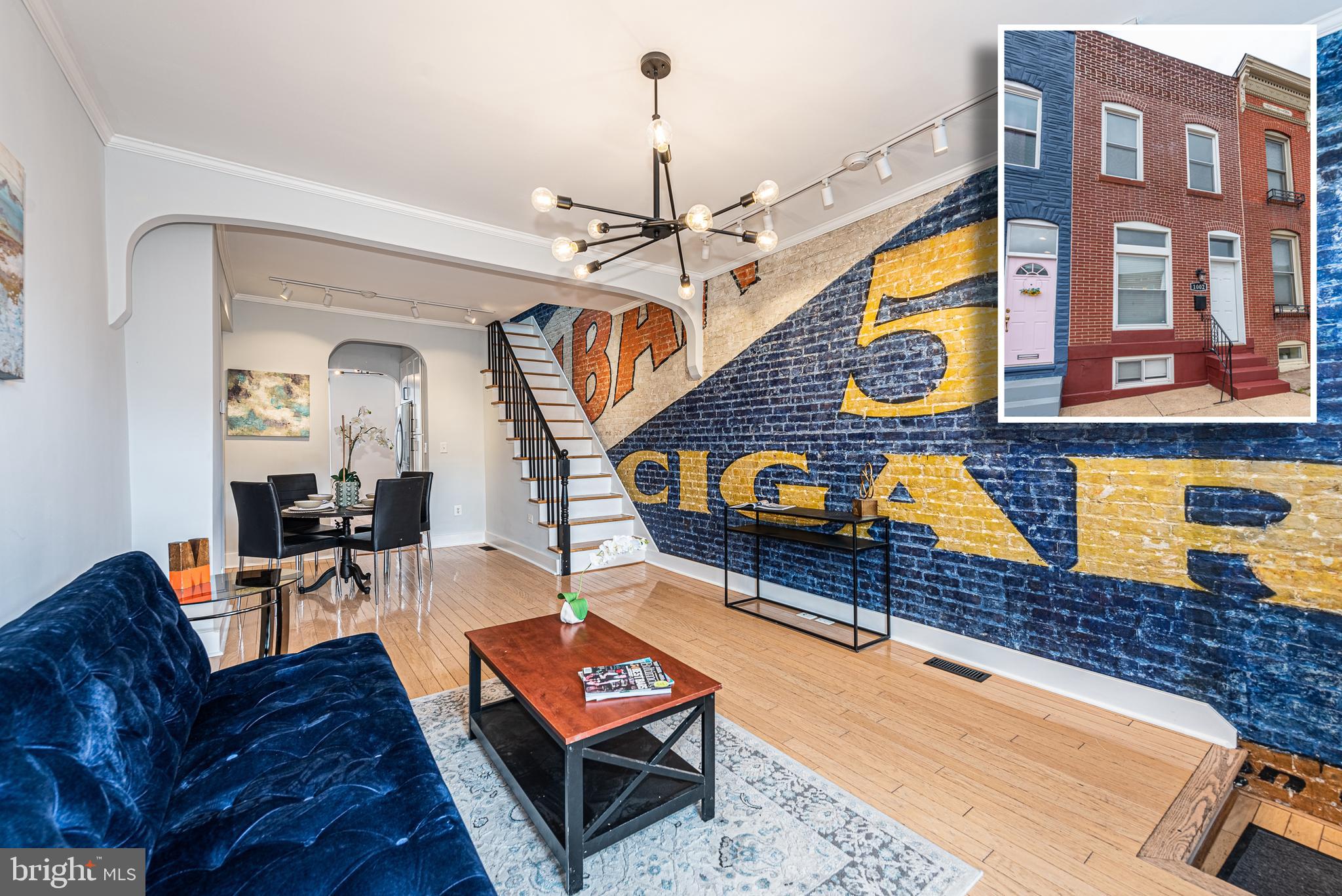 TRULY UNIQUE CANTON ROWHOME WITH 3 FINISHED LEVELS & OVER 1,400 SQ. FT. OF LIVING SPACE! Features include and open floor plan, spacious living room with gleaming hardwood floors and exposed brick mural (featured in the Baltimore Sun), separate dining area, attractive gourmet kitchen with ss appliances, Quartz counters, and subway tile backsplash, convenient main level half bath, upper level with 2 bedrooms and 1 full bath with a clawfoot tub, finished basement with an expansive family room with built-in media center, and a large unfinished portion for laundry and plenty of storage space, and a rear private paver patio with Pergola. Located in the heart of Canton and walking distance to Canton Square, dog park, Merritt Athletic Club, Canton Crossing, and tons of neighborhood restaurants. This is not your typical cookie cutter home - pack your bags and move right in! Click on View Documents to read the Baltimore Sun article regarding the history of the living room mural!