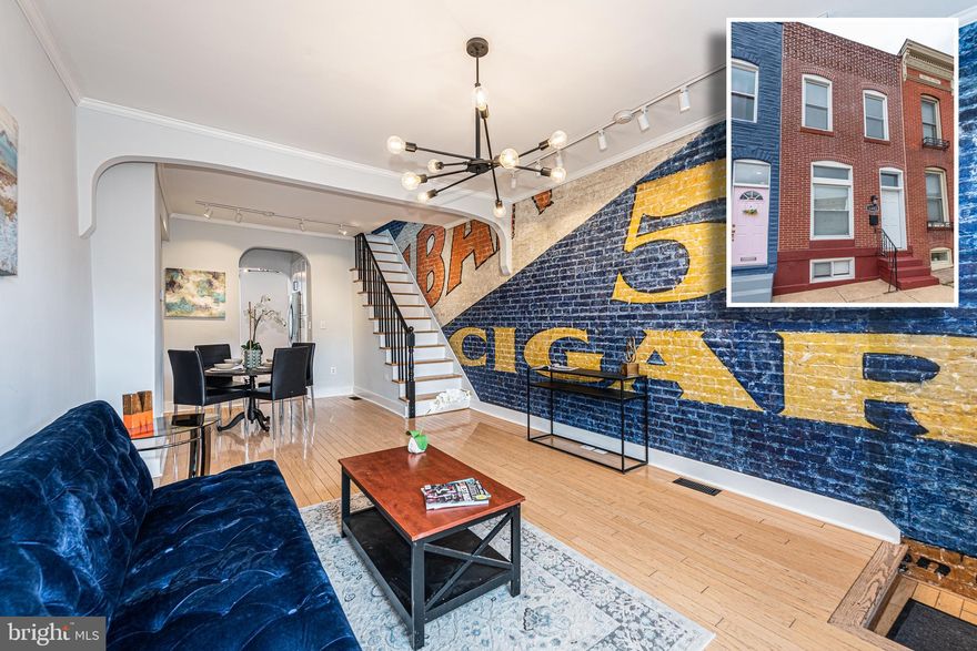 TRULY UNIQUE CANTON ROWHOME WITH 3 FINISHED LEVELS & OVER 1,400 SQ. FT. OF LIVING SPACE!  Features include and open floor plan, spacious living room with gleaming hardwood floors and exposed brick mural (featured in the Baltimore Sun), separate dining area, attractive gourmet kitchen with ss appliances, Quartz counters, and subway tile backsplash, convenient main level half bath, upper level with 2 bedrooms and 1 full bath with a clawfoot tub, finished basement with an expansive family room with built-in media center, and a large unfinished portion for laundry and plenty of storage space, and a rear private paver patio with Pergola.  Located in the heart of Canton and walking distance to Canton Square, dog park, Merritt Athletic Club, Canton Crossing, and tons of neighborhood restaurants.  This is not your typical cookie cutter home - pack your bags and move right in!  Click on View Documents to read the Baltimore Sun article regarding the history of the living room mural!