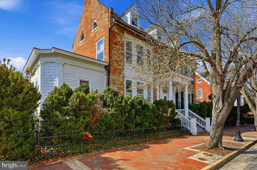 Historic Water Street Inn   a magnificent legacy residence, profitable Bed & Breakfast, or sophisticated professional office opportunity! Located in Winchester's Historic District, two blocks from Old Town Walking Mall! Six large bedrooms and five full baths, this historically significant property is one of a kind, offering private garden spaces, romantic terraces, sunlight filled porches, and floor to ceiling windows cascading natural light throughout. The wrap around stairs will wrap around your heart with charm and the thrill to make this glorious mansion your own. Ideal as a single family residence but also zoned B1 for a bed and breakfast or upscale professional offices. Private parking in the rear is another downtown rarity. Includes carriage house.  Whether enjoying mint julips on a summer evening, entertaining guests, or impressing clients,  fear not, 217 W. Boscawen has arrived! Professional Photos Coming 3.20.26. Asking $1.2M.