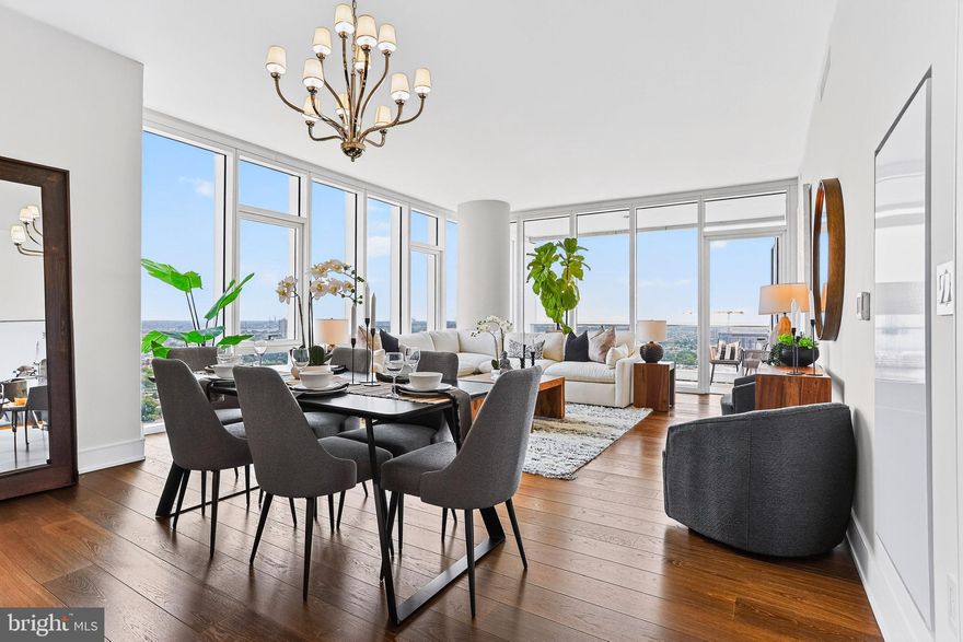 A FULLY FURNISHED, FULLY WOW DECORATED 2BED, 2.5 BATH, 1817 SF single-level residence with Delaware River and southern views priced at $1,575,000! Welcome to Arthaus, a commanding new residential high-rise in Philadelphia’s performing arts district. 

This maintenance-free, move-in-ready corner home offers high-end interior design, resort amenities, white glove services, and the utmost privacy. Tax abatement is available.  Whether you're a busy professional, retiree, or globe trotter, 2302 is a MUST-SEE!

Arthaus impresses you from the moment you arrive. The beautifully grained, solid wood front door swings open to a gracious foyer that's long and spacious, perfect for displaying an art collection. There's also a powder room and coat closet. The entrance meets a hallway to the sleeping wing, where you'll find the laundry area.

Straight ahead is the great room with unobstructed Delaware River and bridge views. Soaring ceilings, floor-to-ceiling windows, wide-plank Havwood flooring in Salvo, and a weather-protected walk-out balcony make the great room feel bright and airy, with plenty of space for entertaining or relaxing with loved ones. Situated on the southeast corner of the building, the views go for miles without a single obstruction making the home feel totally private and tucked into the sky.

The chef’s kitchen is ready for every occasion, with a stylish large center island that seats four. The white and silver ash white cabinets by Poggenpohl add a crisp look that commands attention. Golden Gate Quartz covers the counters and backsplash. The high-end stainless appliance package includes Wolf, Bosch, Sub-Zero, and Asko appliances. The door fronts have been fully integrated into the cabinet design for a seamless, high-end, polished look.

The primary suite and one guest bedroom are on the east side of the condominium, with river and bridge views. The second bedroom has an ensuite bathroom and is a perfect spot for visiting guests. They'll love the east-facing views of NJ. The guest bathroom has a walk-shower tiled in Porcelain Calacatta, a Kohler toilet, and Poggenpohl single sink vanity in polar white matte topped with super white quartz. The elegant owner's suite has a large walk-in closet and a generous sleeping area with river and Jersey views. The best-in-class bathroom package includes a Badeloft soak-in tub, double vanity with Robern mirrors, super white quartz marble and Poggenpohl cabinets, Olympic Sky grey marble floors and shower tile, and a Kohler toilet closet.

Arthaus is a modern masterpiece crafted by renowned developer Carl Dranoff, designed by Kohn Pedersen Fox, and built by Intech Construction. Its architecture and amenities prioritize wellness and well-being, from the stunning Monet-inspired mosaic in the lobby to the private resort on the 6th and 7th floors, featuring a pool, fitness facilities, spa, salon, pet park, outdoor terraces, lawns, gardens, and more. White glove services include a 24-doorman, concierge, chauffeured town car, and valet. 

This home comes with 1 parking license. With the tax abatement, annual real estate taxes are approximately $3,443