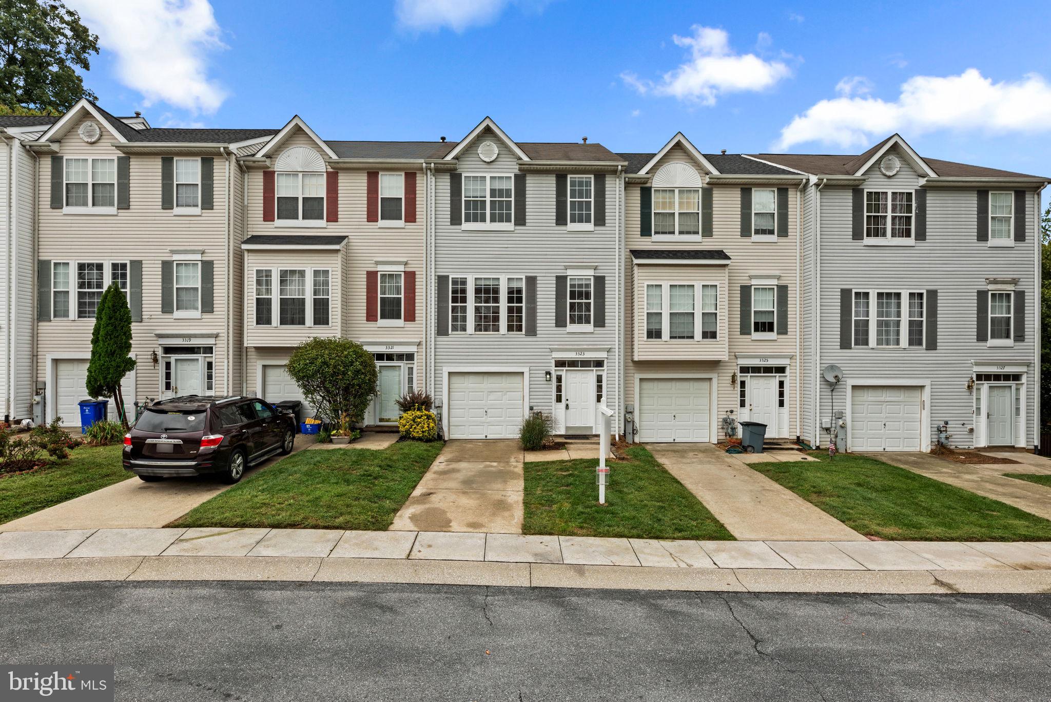 **$25,000 PRICE REDUCTION** This stunning townhouse offers 1,940 square feet of living space, featuring 4 bedrooms, 2 full baths, 2 half baths, and a 1-car garage, all situated on a quaint cul-de-sac in desirable Emerald Knolls. Step inside the entry level, where a welcoming foyer greets you with a convenient coat closet and garage access. Down the hallway, you'll find a spacious recreation room or bedroom with plush carpeting, an additional storage closet, a laundry area, and a half bathroom. This versatile space is perfect for hosting friends or family as a guest suite, complete with walk-out access to the exterior. Heading upstairs, discover a gorgeous, sunlit living room on the main level, featuring wood floors, charming wainscoting details, and a stylish powder room. The eat-in kitchen and dining room offer chair rail accents, stainless steel appliances including a gas range, granite countertops, ample cabinetry, a pantry, an island with seating, and a cozy breakfast area with deck access. The upper level features three plush carpeted bedrooms, including a spacious owner’s suite with a walk-in closet and a spa-like en suite bathroom with a luxurious soaking tub and separate shower. A beautifully updated full bathroom with a built-in shower shelf completes this level. The fully fenced yard features a stone fire pit, a garden bench, and a deck with a covered patio beneath, creating a perfect outdoor retreat with tree-lined views. Emerald Knolls offers a tranquil residential setting with convenient access to nearby amenities, including shopping and dining along Route 40, featuring a Walmart® just minutes away for added convenience. Additionally, Old Ellicott City Main Street is nearby, and residents can enjoy recreational opportunities at Patapsco Valley State Park, with easy commuting options via Route 29 and I-70.