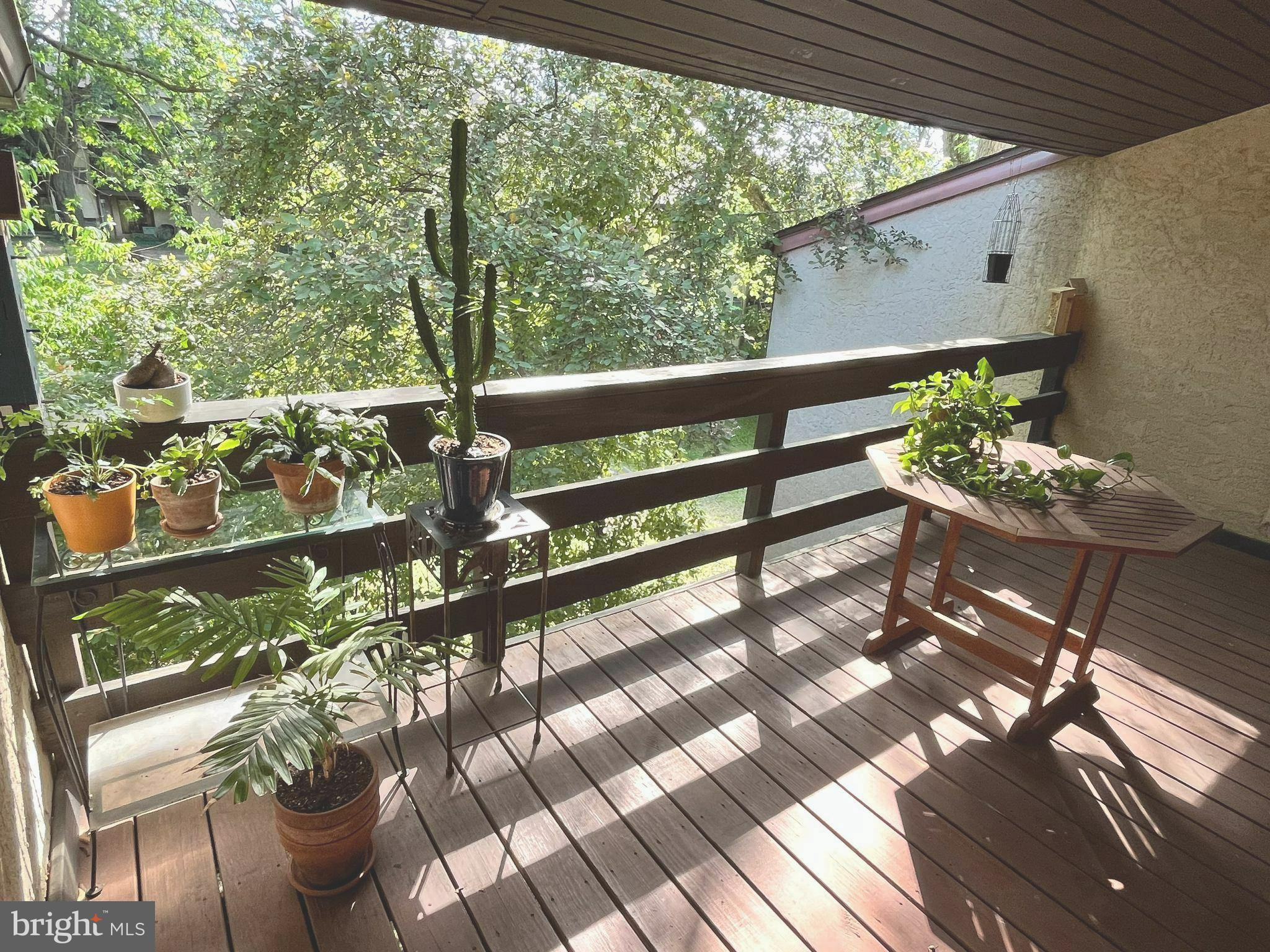 Want to spend your summer swimming, grilling, and enjoying nature, from the leisure of your own home? You're in luck! Enjoy a stay-cation in your own "backyard" at Green Tree Run, unit 291 G. This *pristinely* kept two bed, two full bath unit offers the ideal blend of practicality and low-maintenance! Enter at ground level to a functional landing w/coat closet, then ascend the steps into your spacious flat. The stylish front facing kitchen allows natural light to cascade through a canopy of green, creating a zen ambience while cooking with your stainless steel appliances. In the main room you'll find the extra long living space is conducive to even the largest furniture set, with depth enough to include an office nook beside the bifold storage closet. A timeless chandelier helps to define the dining area- spacious enough for a full sized dining table w/leaf. Follow the hall to the front of the house, where you'll meet the first of two sizable bedrooms. W/double closet and space for a king bed- it makes a perfect guest room, nursery, office, etc. Off this bedroom is a full sized hall bathroom- beautifully renovated with sleek finishes and a tub shower. Linen closet and curated laundry closet are also located in the hall...w/ laundry spacious enough for FULL sized washer-dryer! The large primary bedroom features dual-closets and a second (also beautifully renovated!) en suite with full-sized glass-front shower. Double sliding-glass doors, both in the primary bedroom and living room, lead to a PRIVATE sundrenched balcony! A dreamy space to unwind with a glass of wine, book, or a meal... It also hides two huge storage closets! If you've had enough private time outside, head to the "Tree House" and enjoy swimming or grilling at the MASSIVE OUTDOOR POOL! Enjoy cornhole or a picnic on the lawn, splash with kids in the "baby" pool, or get some laps in! Rainy day? Take things to the INDOOR POOL or enjoy the game room, library nook, fitness center, lounge/event room & bar, etc. With *most* utilities, outdoor maintenance, assigned parking & lot all *included* in your HOA fee... All there is to do is move-in! With a generous ALLOWANCE being offered for new flooring, or project of Buyer's choosing- this listing truly will not last long.