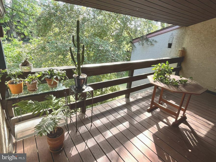 Want to spend your summer swimming, grilling, and enjoying nature, from the leisure of your own home? You're in luck! Enjoy a stay-cation in your own "backyard" at Green Tree Run, unit 291 G. This *pristinely* kept two bed, two full bath unit offers the ideal blend of practicality and low-maintenance! Enter at ground level to a functional landing w/coat closet, then ascend the steps into your spacious flat. The stylish front facing kitchen allows natural light to cascade through a canopy of green, creating a zen ambience while cooking with your stainless steel appliances. In the main room you'll find the extra long living space is conducive to even the largest furniture set, with depth enough to include an office nook beside the bifold storage closet. A timeless chandelier helps to define the dining area- spacious enough for a full sized dining table w/leaf.  Follow the hall to the front of the house, where you'll meet the first of two sizable bedrooms.  W/double closet and space for a king bed- it makes a perfect guest room, nursery, office, etc.  Off this bedroom is a full sized hall bathroom- beautifully renovated with sleek finishes and a tub shower. Linen closet and curated laundry closet  are also located in the hall...w/ laundry spacious enough for FULL sized washer-dryer! The large primary bedroom features dual-closets and a second (also beautifully renovated!) en suite with full-sized glass-front shower. Double sliding-glass doors, both in the primary bedroom and living room, lead to a PRIVATE sundrenched balcony! A dreamy space to unwind with a glass of wine, book, or a meal... It also hides two huge storage closets! If you've had enough private time outside, head to the "Tree House" and enjoy swimming or grilling at the MASSIVE OUTDOOR POOL! Enjoy cornhole or a picnic on the lawn, splash with kids in the "baby" pool, or get some laps in! Rainy day?  Take things to the INDOOR POOL or enjoy the game room, library nook, fitness center, lounge/event room & bar, etc. With *most* utilities, outdoor maintenance, assigned parking & lot all *included* in your HOA fee... All there is to do is move-in! With a generous ALLOWANCE being offered for new flooring, or project of Buyer's choosing- this listing truly will not last long.