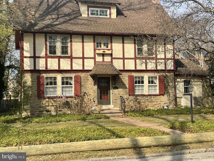 Elkins Park Colonial with 5 bedrooms, 2.5 bath, designed by Horace Trumbauer.  Unique property with blend of old and new with many updates over the years.  Deep windowsills and hardwood floors throughout the home.  Paver walkway to front door entry into center hall with coat closet.  Updated gourmet kitchen with custom cabinets and center island, tile backsplash, stainless steel appliances, GE double-door refrigerator, GE gas oven with 5 burners, overhead Braun hood with fan/light, Bosch dishwasher.  Open to breakfast room with bay window and pantry closet.  Powder room with pedestal sink, formal dining room with 2 built-in cabinets with glass front doors, Formal living room with wood burning fireplace, custom wood mantel with brick surround and base and study/sitting room with ceiling fan, carpeting and lots of windows.  Screened-in porch with slate floors, 9-foot ceilings, ceiling fan/light combination with outside entrance to slate patio and rear yard. Wood staircase with carpet runner to 2nd floor landing area with custom windows.  Master bedroom 23 x 13 with 2 closets, double French doors to roof deck 16 x 11 with awning.  Updated full bathroom, tiled floors, half walls and tub surround.  2nd and 3rd bedrooms with hardwood floors and closets.  3rd floor with large cedar closet in hallway.  4th and 5th bedrooms with fresh paint, new carpeting with closets, built-in wall drawers, full bathroom in hallway with tile floors and tub surround.  Hugh spacious unfinished basement with laundry tub and washer/dryer.  Crown gas fired heater, Rheem hot water heater. Conveniently located to major highways, 309, 476, turnpike, close to center city, hospitals, universities, local restaurants, shopping, train station, library, parks, trails, public transportation and much more!