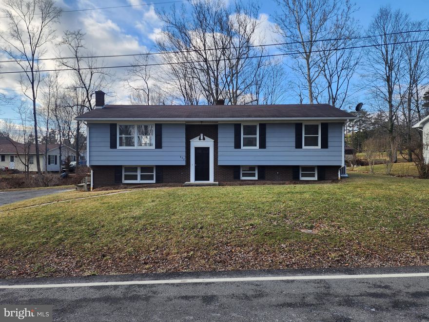 UPDATED, SPACIOUS, AND CONVENIENT.  THIS RECENTLY REMODELED HOME FEATURES A BEAUTIFULLY RESTORED KITCHEN AND BATH, A LARGE LIVING AND DINING AREA,  AND LUXURY VINYL PLANK FLOORING THROUGHOUT.  THE PARTIALLY FINISHED BASEMENT INCLUDES A FULL BATH AND MULTIPLE ROOMS TO USE AS YOU CHOOSE -  POSSIBILITIES WOULD EASILY INCLUDE A 4TH BEDROOM AND A MUD ROOM INSIDE THE GROUND LEVEL ENTRANCE FROM THE DRIVEWAY.  THERE IS ALSO PLENTY OF ROOM FOR A NICE SIZED REC-ROOM.  THE PROPERTY IS SITUATED ALONG "STONY RUN" WHICH PROVIDES A PEACEFUL REAR DECK EXPERIENCE.  LOCATED WITHIN MINUTES OF THE HOSPITAL, WALMART, PHARMACY, AND MORE.  THIS ONE HAS A LOT TO OFFER FOR THE PRICE.  YOU SHOULD CHECK IT OUT TODAY, OR IT MAY BE GONE!