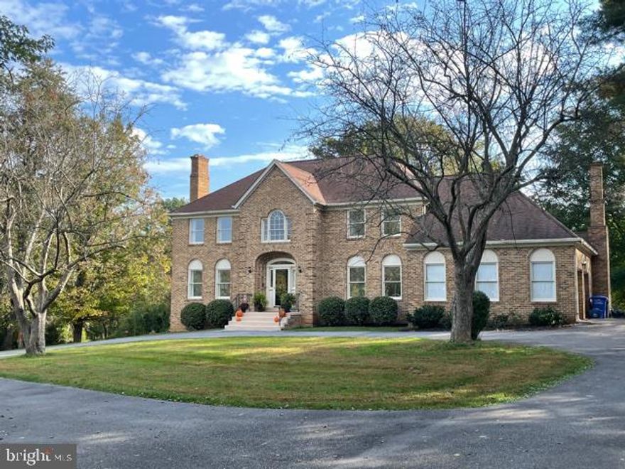 Fantastic space in this attractive, all brick, Georgian colonial sited on two level acres just minutes to Potomac Village.  Dramatic two story foyer w/sweeping staircase, generously proportioned rooms including a Formal Living Room & Dining Room, beautifully renovated Chef's Kitchen with Center Island, under cabinet lighting, big tablespace area; Family Room with brick accent wall with fireplace, coffered ceiling, sliding glass doors to rear deck; large, private home office and separate laundry room.   Spacious Primary Suite w/nursery/sitting room; full bath w/vanity area and two walk-in closets that could be transformed into a magnificent bathroom.  Just bring your dreams!   Fully finished, daylight, walk-out lower level w/au pair suite, HUGE recreation room and renovated full bathroom.  Level two acres awaiting your plans---maybe a stone terrace with a patio?   a pool and spa??  There's room aplenty!  Close proximity to the C&O Canal access, the River Road corridor, back roads to the BioMed Corridor north off I-270.   Close-in shopping at Potomac Village, Traville or Falls Grove.  Churchill school cluster.