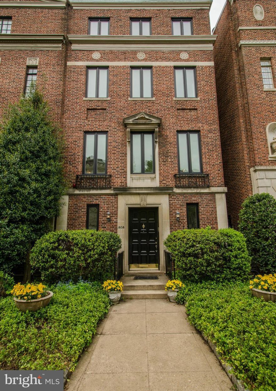 Renovated and expanded brick and stone townhouse located in one of Washington's most elegant rows.Home features formal entertaining spaces with lovely original detail, gourmet table space kitchen plus wonderful open family room and charming flagstone patio with deck. Amenities include an elevator  newer systems & windows 2 car garage.