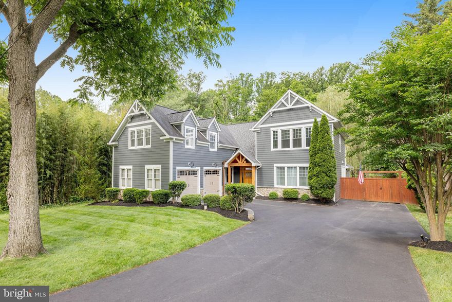 Welcome to this beautifully expanded and renovated 5-bedroom, 4.5-bathroom single-family home offering 4,234 total square feet of comfortable living space in sought-after Dunn Loring. Situated on a quiet dead-end street with direct access to the W\&OD Trail, this 0.31-acre property features a fully fenced backyard oasis complete with a covered patio, outdoor fireplace, outdoor kitchen, and flat yard—perfect for year-round entertaining.

Inside, the thoughtfully designed floor plan includes a rare main-level bedroom with en-suite bath, a dedicated office, and a spacious Family Room with vaulted ceilings for added light and dimension. The renovated kitchen (2010) is central to the home and ideal for gatherings, flowing seamlessly into the living and dining spaces.

Upstairs, you’ll find four generously sized bedrooms and three full baths, including a  Primary Suite with vaulted ceiling, separate vanities, a soaking tub, and a walk-in shower. A conveniently located laundry center completes the upper level.

The finished lower level offers a cozy recreation room, ideal for movie nights, hobbies, or play space. Use this as an extra office space, if needed. 

Additional highlights include a 2-car garage, ample driveway and street parking, and proximity to Dunn Loring Metro, I-66, Gallows Road, and I-495—an unbeatable location for commuters and outdoor enthusiasts alike.