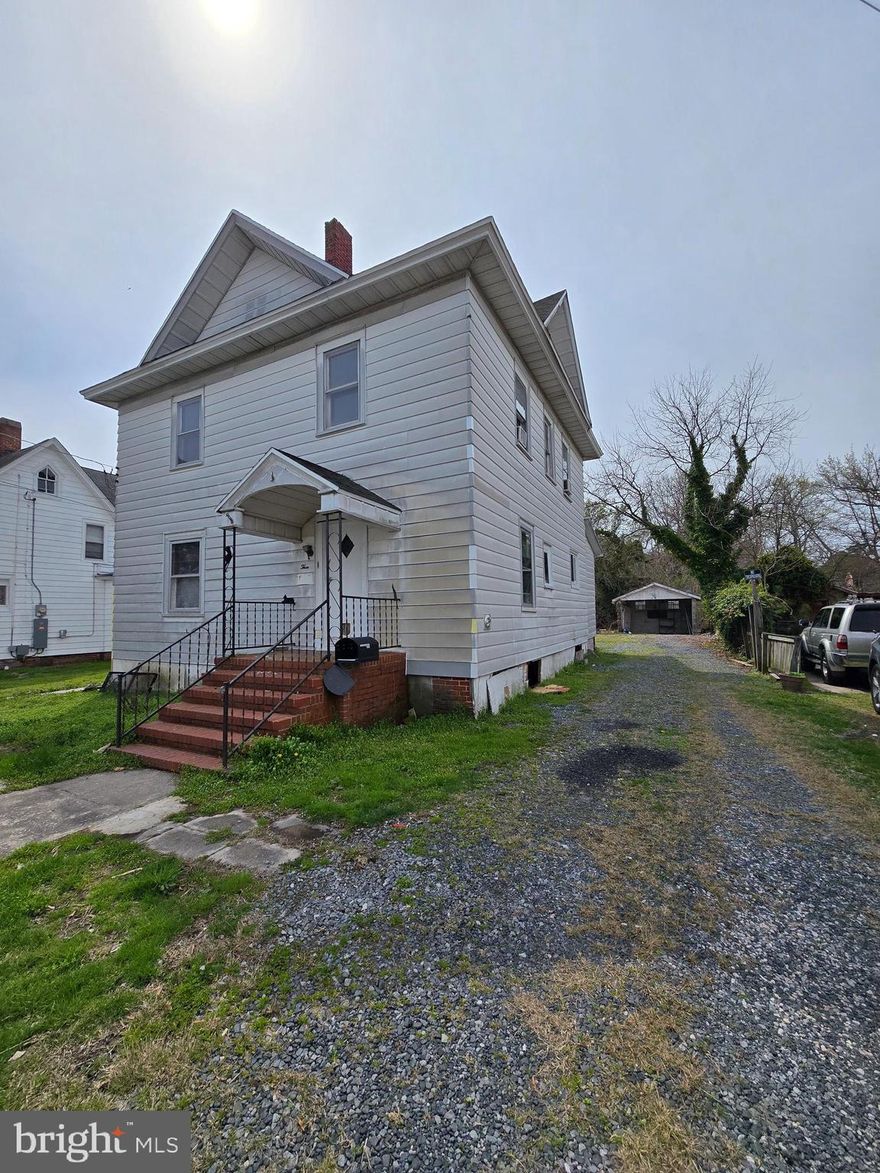 Large old farm house with 4 bedrooms and 1 bath. As you enter the house you will notice the beautiful wood floors in the family room.  The family room is massive in size and could be split to make a down stair bedroom and bath.  The dining room is in front of house with large kitchen in back. The home needs a major rehab but is built very solid. There is a large deck with ramp on back of home. New roof has been put on the last couple years.  Nice back yard with open garage space and shed.