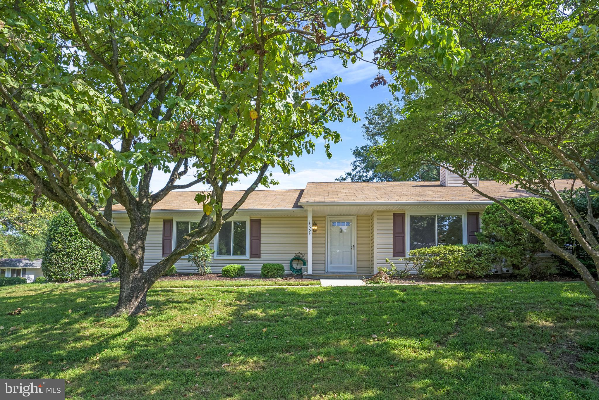 Welcome to Leisure World! This 3 bed, 2 bath home is now available! This lovely patio home features fresh paint, new carpet, a fireplace and ample storage throughout. The garage has been renovated into a spacious family room! The main level is host to a living room, formal dining room, family room, 3 bedrooms and 2 bathrooms. The sun-filled primary bedroom includes large windows and an ensuite bathroom! The secondary bedrooms can be used for either a guest room or home office. Take advantage of your partially covered flagstone patio and use it to entertain friends and family, grill out or enjoy fresh summer cocktails! Leisure World is an award-winning active adult community, offering a maintenance-free lifestyle convenient to DC, with resort-style amenities: 2 clubhouses, 3 recently renovated restaurants, redesigned ballroom, indoor and outdoor pools, tennis and pickleball courts, walking trails, 18-hole championship golf course and 5400 sqft fitness center. Can’t get any better than this! All square footage and dimensions, though compiled from sources deemed reliable, are estimates.
