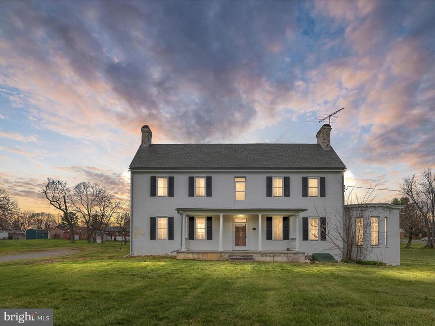 Step back in time in Stephen's City's crown jewel, Thomas Rittenour House.  This classic brick colonial home was built in 1830 and sits on the most prominent lot in town.  Step inside to find gleaming hardwood floors, a formal dining room, 5 fireplaces, vintage baths, and a cute updated kitchen with antique 60" stove.  Library with floor to ceiling Victorian bay window and antique reproduction wallpaper from Sweden.   All new energy efficient mini split system added in 2022.   A MUST SEE!