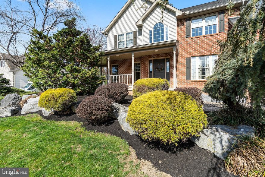 Located in the established Liberty Estates community, this spacious colonial home offers numerous recent updates and versatile living options. The main level has been freshly painted and features durable vinyl flooring throughout, while new carpet adds comfort to the family room.

Enjoy outdoor living with an extended back patio and a fully fenced yard, complete with attractive vinyl and security fencing surrounding the in-ground heated pool, which includes a newer liner.

Inside, the home features a cozy family room with a gas fireplace, a convenient half bath on the main level, and five generously sized bedrooms. The primary suite boasts a spacious bathroom, and an additional large upstairs bedroom can serve as a bonus room or guest space.

Custom closets are found throughout much of the home, providing excellent storage. A main-level bedroom includes a walk-in senior shower, offering the potential for true one-level living. Washer and dryer hookups in the kitchen pantry closet offer seamless potential for installation, enhancing the home’s flexibility and making it well-suited for extended family or guest living.

Additional highlights include two hot water heaters (one recently replaced), ensuring ample hot water supply, no HOA fees, an oversized two-car garage with extra storage space, and a central vacuum system in the basement.
