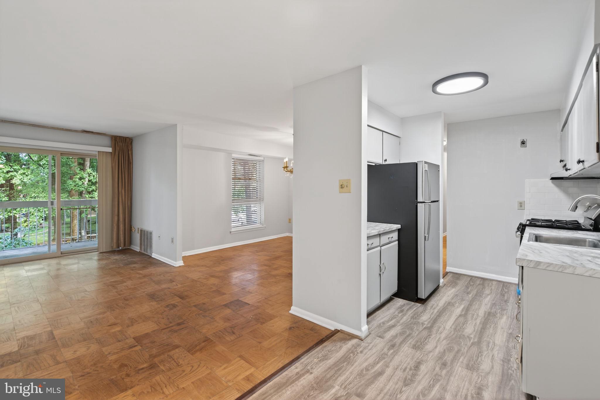 2211 GREENERY LANE 103-6