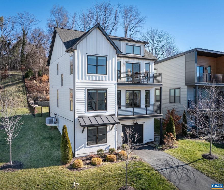 Tucked away on a quiet street in popular BELMONT, this stunning home with a contemporary flair enjoys double balconies to take in VIEWS of Carter?s Mountain & Blue Ridge sunsets. Move-in ready and feels like new! Drenched w/ LIGHT, the floor plan has an open, breezy feel. ZERO CARPET w/ hardwoods and ceramic tile. No ?extra? was overlooked and you?ll find UPGRADES everywhere! The main living level with open DR & LR opens to a balcony on one side and covered porch on the other. Chef?s kitchen is a stunner: large island w/ gleaming granite, contrasting cabinetry & room for seating, gorgeous maple cabinetry runs to the ceiling with lighted, glass-front cabinets, GE Signature Profile appliances w/ 5-burner gas cooktop, roomy pantry. Step out to take a dip in the HOT TUB and enjoy a view of the terraced GARDENS. Upstairs, the primary suite is pitch perfect w/ vaulted ceiling, a balcony, upscale bath and WIC w/ built-ins. Two more bedrooms, one used as a home office, share a hall bath. A bonus? Ground floor ensuite BR could serve as second MBR. SOLAR panels mean very low electric bills! FENCED for your furry friends. All this, and close to popular Belmont restaurants, the downtown mall and Rivanna Trail. COMFORT & CONVENIENCE!,Glass Front Cabinets,Granite Counter,Maple Cabinets,Fireplace in Living Room