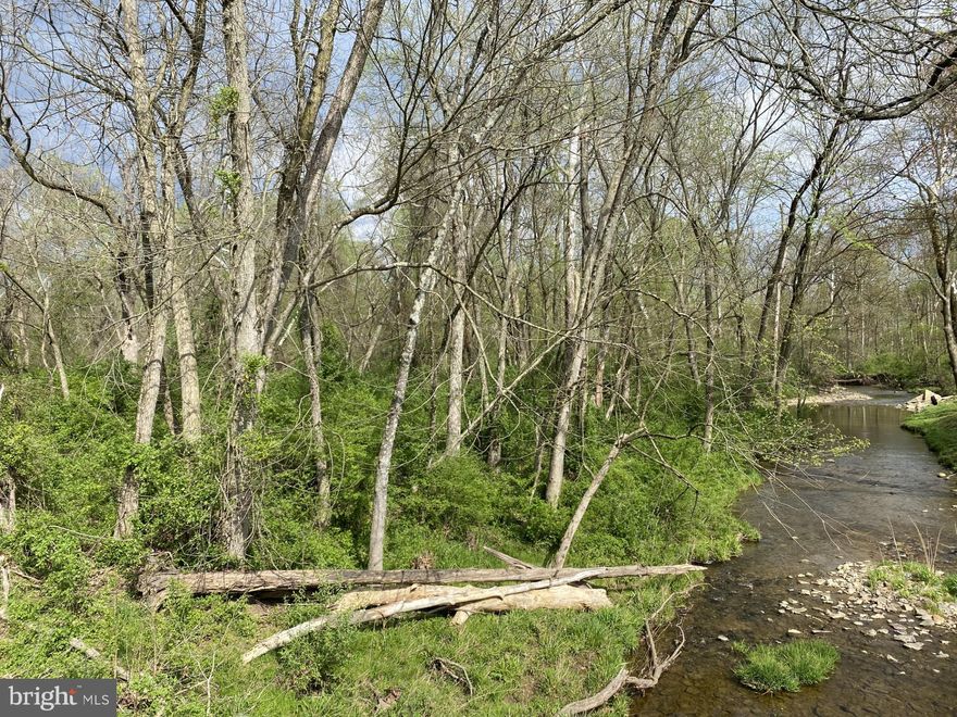 1.68 Acres Zoned Residential land.  Located on Paradise Rd, across from Cronin Dr intersection.  Refer to Floodplain map in documents for information.