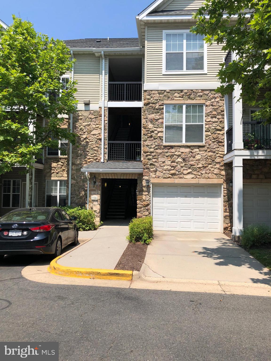 COZY, GROUND FLOOR UNIT OFFERS OPEN FLOORPLAN WITH LARGE LR/DR/KIT AREA, 2 LARGE BRS, 2 FULL BATHS, BONUS ROOM CAN WORK AS DEN/OFFICE PLUS 1 CAR GARAGE! GATED STONEGATE AT FAIRCREST COMMUNITY BOASTS FITNESS CENTER, OUTDOOR POOL, CLUBHOUSE, PARTY RM, BUSINESS CENTER! UNIT OFFERS FOYER ENTRANCE AND PATIO ENTRANCES! LAUNDRY CLOSET IN UNIT W NEW, FULL SIZED WASHER AND DRYER! EACH BR HAS WALK-IN CLOSET! OPTIONAL BUILDING STORAGE BIN $25/MONTHLY IF OVERSIZED GARAGE ISN'T ENOUGH! 1 CAR GARAGE PARKING ( G-201), ASSIGNED PARKING SPACE (#72) PLUS VISITOR PARKING SPACES! SMALL DEN/OFFICE HAS BUILT IN NICHE, COULD ALSO BE USED AS A NURSERY! HVAC NEW IN 2022! WILL CONSIDER PETS. WATER, SEWER AND TRASH INCLUDED IN RENT. CONVENIENT LOCATION NEAR 66, 28, 29, FFX COUNTY PKWY, FAIRFAX CONNECTOR BUS, 1 MILE TO FAIR LAKES...PARK IN REAR OF BUILDING IN SPACE #72 AND ENTER IN BREEZEWAY TO THE LEFT. PARK IN REAR OF BUILDING IN SPACE #72. USE NVAR APPLICATION. APPLICATION FEE PER ADULT, WILL CHECK CREDIT, INCOME, EMPLOYMENT AND RENTAL HISTORY. SEPT 1 START DATE, CURRENT TENANT MAY BE OUT A WEEK OR SO EARLIER. CEILING IN MAIN ROOM TO BE PAINTED.