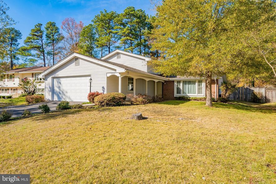 Welcome to this 4 bedroom, 3 full bath  updated home in the lovely Pinefield neighborhood!  A tiled entry invites you into this tranquil living space where you can enjoy the freshly painted main level and loads of natural light from the expansive picture window in the living room.  A separate dining room follows the living room into the kitchen.  The kitchen has been updated with over-sized maple cabinets for plenty of storage space and recess lighting. The kitchen also gives access to the patio for easy grilling! Upstairs you will find the master suite with dual closets and private bathroom. The master bathroom has been updated with tiled shower and flooring. Two additional bedrooms and an updated hall bathroom complete this level.  On the lower level you will find the family room with huge brick fireplace with wood burning stove for extra warmth, built in shelving, and beautiful glass doors to the patio.  A lower level bedroom , full bathroom, and laundry complete this level.   Enjoy your outdoor living space in your fenced back yard with patio and sheds. Additional upgrades to the home are a new water heater installed in 2018,  new cement patio/steps in 2018,  new roof installed 2017, and new garage door opener in 2017. A must see!