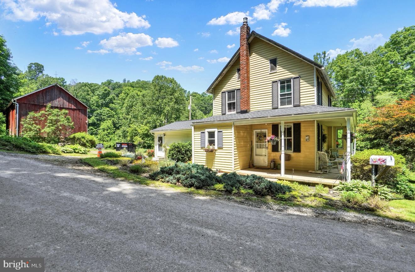 Nestled on a sprawling 6.37 acres in the highly sought-after Red Lion School District, this three-bedroom, one-bathroom house presents a unique opportunity for those with vision and a desire to build sweat equity. Beyond the charming home, which features a huge room ideal for entertaining, the expansive grounds offer a picturesque setting. A barn on the property provides versatile space for hobbies, storage, or even potential livestock. Imagine starting your day on the deck, enjoying picturesque views of the tranquil creek, or strolling through the gorgeous meadow behind the house next to the barn, where the creek's soothing sounds are always within earshot. A section of woods further enhances the natural beauty and privacy of this remarkable property. This is more than just a house; it's a chance to create your dream home and a lifestyle to match, all within a prime location. Don't miss this rare opportunity to transform a diamond in the rough into your personal masterpiece.