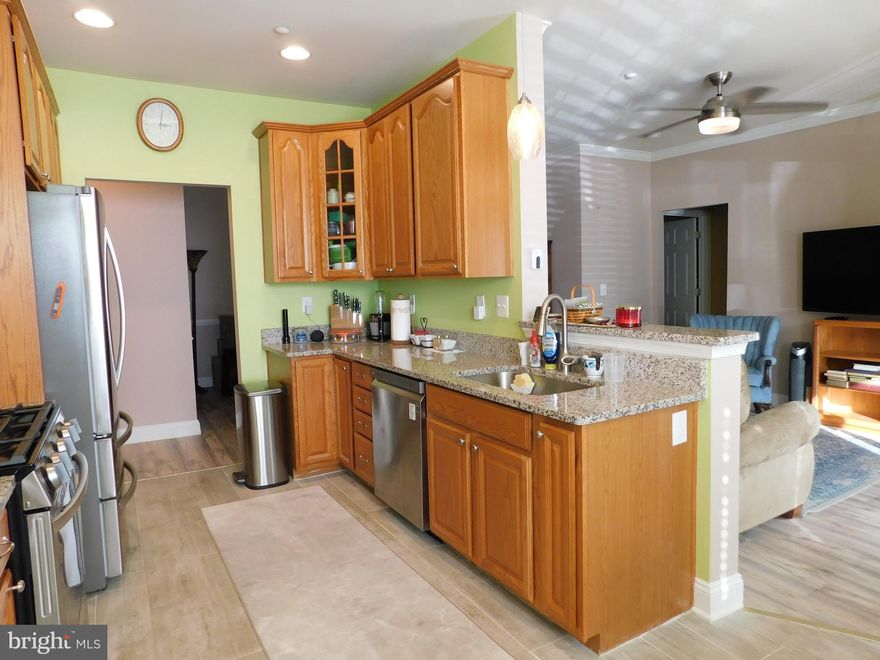 Downsizing? Tired of all those steps? Don't miss this Ground level, Handicapped accessible Condominium unit in an adult 55+ community.  Renovated and  Updated since 2021 to include: luxury vinyl plank (LVP) waterproof wood tone flooring in living room, dining room, hallways, and bedroom no. 2; ceramic tile wood tone flooring in kitchen; ceramic tile flooring in bathrooms; wall-to-wall carpet in primary bedroom, walk-in closet, and den; all windows except small window in breakfast nook; custom blinds throughout; sliding glass door; natural gas HVAC system; kitchen appliances - stainless steel natural gas stove, refrigerator/freezer, dishwasher, built-in microwave; ceiling lights in kitchen; ceiling fan/light in living room; washing machine and dryer; new paint in kitchen, living room, dining room, and hallways.  Condo/HOA dues include water, sewer, trash, common area maintenance, clubhouse, community center, exercise room, pool.   See MLS documents for  detailed brochure, condo declaration and bylaws, and Seller disclosures.