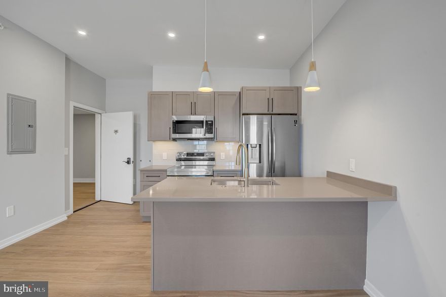 Welcome to Innovator Village, nestled in the heart of Graduate Hospital! This gated community is home to 82 luxury units featuring top of the line finishes. 2445 Innovator Way offers everything you could desire in a city apartment. This unit features a spacious, open living room with huge windows and lovely natural light, a kitchen with quartz countertops and stainless steel appliances, a beautiful bathroom, hardwood floors and an in unit washer/dryer. The building features a shared roof deck with beautiful views of Center City. Innovator Village is located on the bustling Washington Ave corridor with easy access to Drexel University, CHOP, Penn University, I76, restaurants, shops, public transportation and much more!