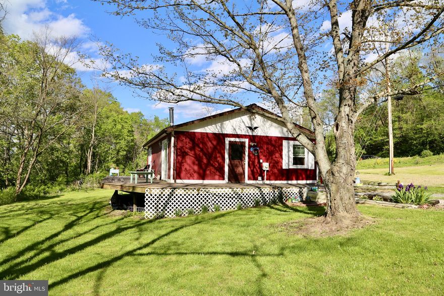 A rare find! 2BD/1BA river house sitting on the banks of the distinguished Lost River, with over 400 ft of river frontage. Enjoy owning a cabin in unrestricted, historical Lost City, right on the edge of the Lost River Valley. Already equipped with High Speed Fiber Optic Internet, you can work remotely and vacation at the same time. There is a wet weather spring on property. With some updates this could be a perfect vacation rental/investment property. New roof, new doors/windows and updated electrical panel in 2016. Less than 20 miles from Wardensville, WV. 30 miles from Broadway, VA. Approx. 2 hours from Washington, DC. Plan your trip to see this gem today!