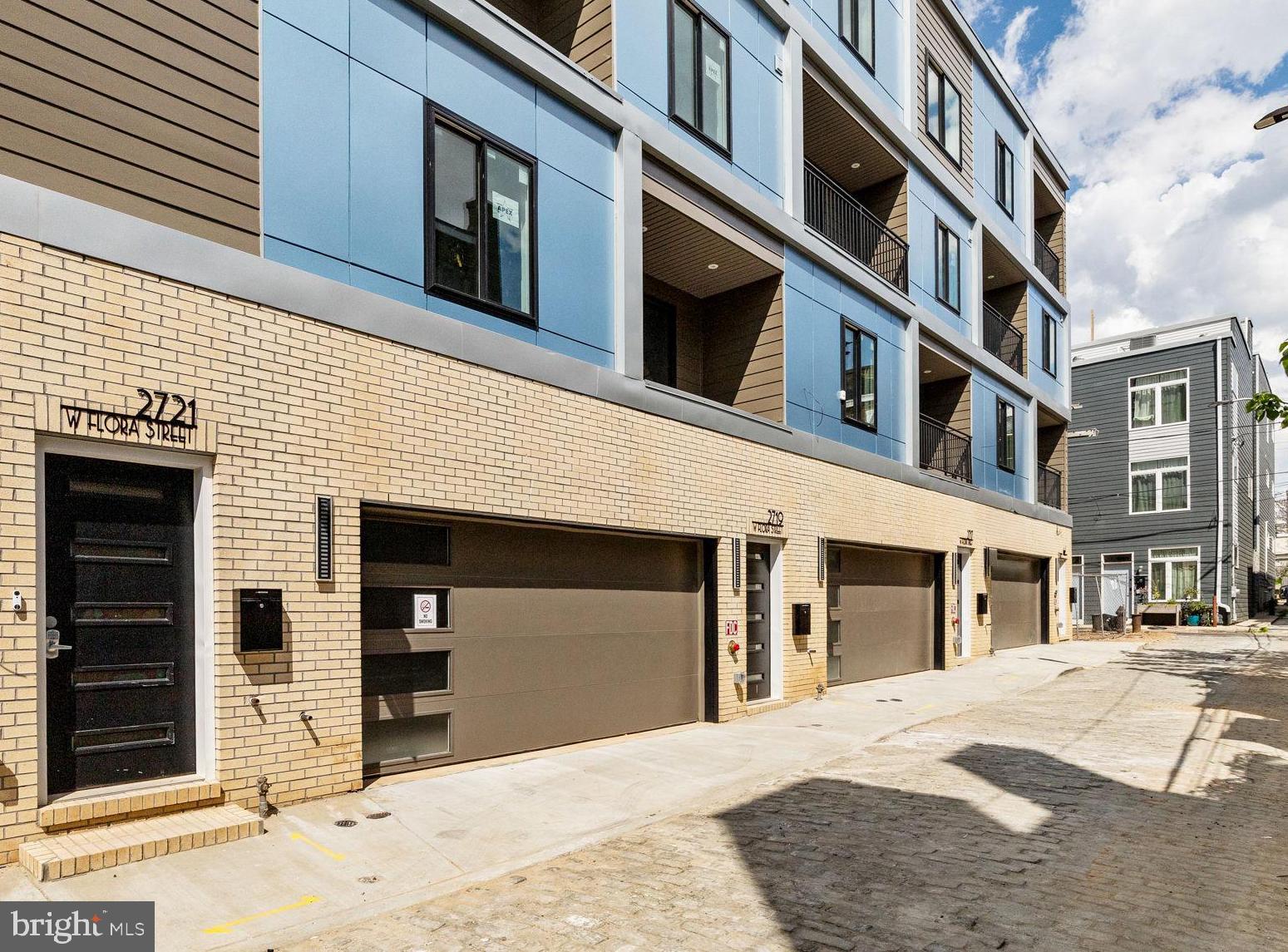 Introducing 2719 W. Flora Street! This luxury, new construction home impresses immediately with two-car garage, elevated finishes, and unparalleled views of Center City Philadelphia. On the entry level, 9 foot ceilings dominate the oversized two-car garage, storage closet, and interior foyer. (Garage is already prewired for a Level 2 EV charging station.)
On the main level, oversized windows and the first of three outdoor spaces greet you. The southern exposure of this home immerses the residence with year-round natural light. The floating stairwell with glass partition brings light into the hallway and elevates the entire lived experience. Hardwood floors throughout living areas. Upgraded kitchen with shaker white or gray cabinets, calcutta quartz countertop, and Cerrad porcelain white tile backsplash. Oversized living and dining area. Tiled powder room on the main level for convenience.
The second floor is dominated by the primary bedroom suite, and you'll love the laundry at the top of the stair for convenience. Ample room for a king-sized bed, big walk-in closet as well as a secondary closet, and a decadent primary bathroom with water closet, double vanity, walk-in shower, and soaking tub. Even better, there’s a private, second balcony in the bedroom as well!
Two additional bedrooms on the third floor. Each room could serve a myriad of uses: guest or household bedroom, nursery, home office, or even home gym. Full bathroom with double vanity and shower/tub. Private balcony for third bedroom with city views. Wet bar at roof deck stairwell perfect for entertaining guests or a second coffee pot if you're working upstairs.
Of course, incredible Center City views from the 23-foot wide roof deck. It’s great in the daytime and even better at night. A short walk to Fairmount Park, Athletic Square, and around the corner from The Boozy Mutt and Crime & Punishment Brewing Company.
Ten year tax abatement. Quiet street. Be confident of completion in June 2025. Visit an open house this weekend or schedule your private showing today!