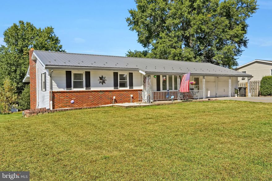 This Mountain View Terrace Ranch  is ready for its new owners with newer metal roof, oversized covered back deck, 2 car attached heated garage with work benches and first floor laundry services.  Come enjoy this 3 bed, 2 bath ranch which is traditional in design with comfortable spacing on easy first floor living.  Kitchen was updated in past, and provides full appliance package.   This home has central air, and an updated bath on main floor, 2nd full bath in basement with wash sink, and 2nd set of laundry hookups.  Basement is finishable and ready to create a Den space for all to enjoy which is a walkout to the nice yard with a conveniently built-in storage/garden tool area under the deck.  Wide usual macadem drive provides ample parking for guests.  Location is key, and curb appeal is here.  Don't wait.  Call to see this home today!