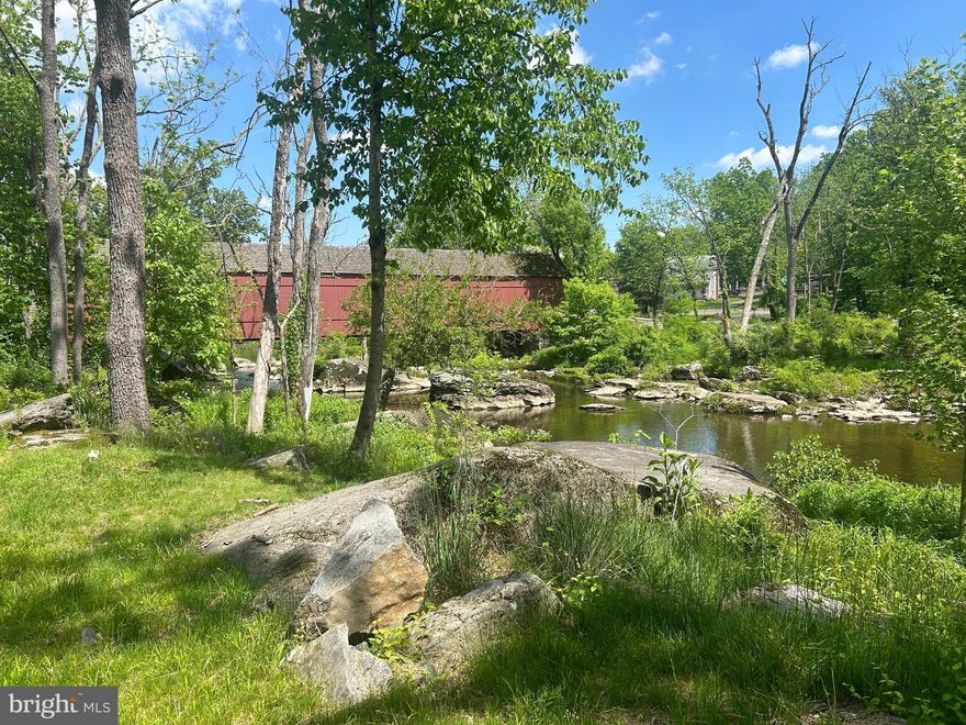 Very tranquil and serene property along the water  with a view of the Sheard's Mill covered bridge. Current owner uses for a weekend get away. Previous owner had 15 campsites and residence. House is in bad condition and is  a tear down.  Proposed plans for a new house and a septic permit from 2022 are available. Airstream can convey with full price offer.