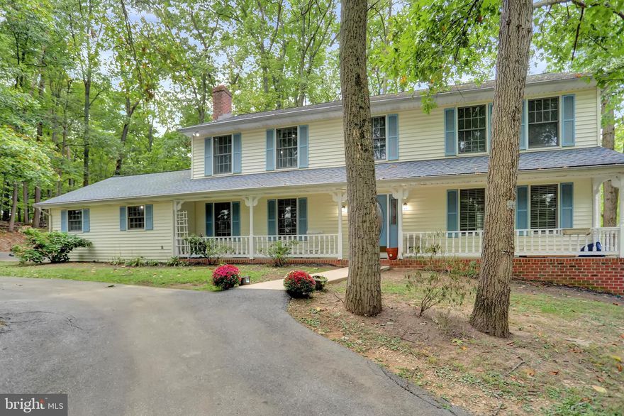 The long driveways lead you to this hidden gem. This beautifully maintained property affords you all the privacy you need!  Updated  furnace, water heater, refrigerator & roof. 4 BR, 2.5 BA on 4+ acres in Smallwood area of Westminster.  Wood burning fireplace in family room, across from another huge living room, plus two finished rooms in the basement could be used as home office, den or study.  High ceilings in an eat in kitchen with island & large deck; separate dining room all ideal for entertaining. Central Vacuum makes it easy to maintain! Horses are permitted. Bedrooms are large enough for king-sized beds. The main room also has a large bath equip with jacuzzi tub and separate  shower.  The owner has left a few small projects for you to complete. This home is waiting for you!