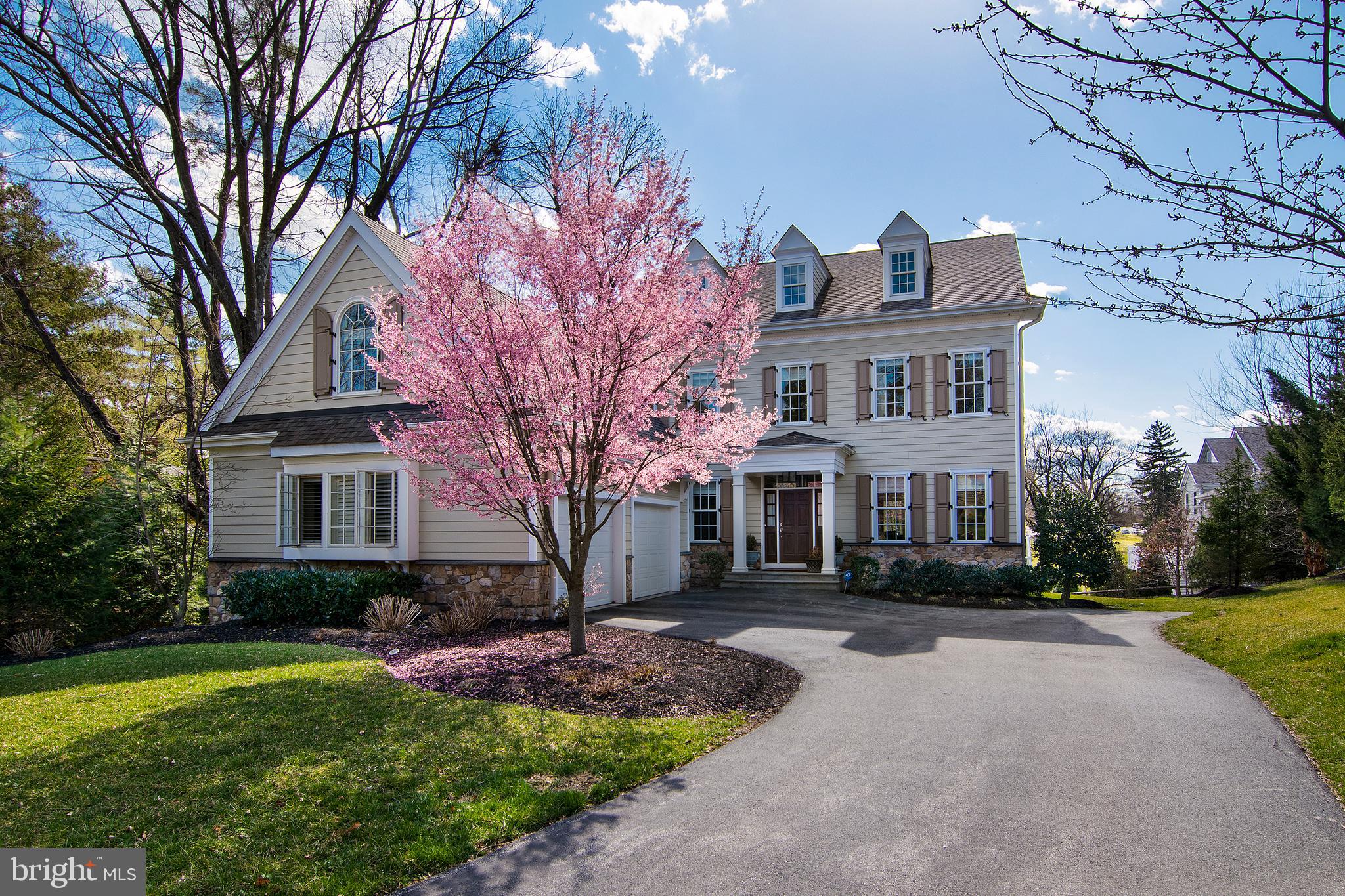 This magnificent home is nestled in the heart of Bryn Mawr (between Airdale & Orchard Lane) and in the award-winning Radnor School District. This newer open and bright colonial home is completely move-in ready. This home features four bedrooms, four and a half bathrooms, with a lovely modern flow and luxurious finishes. You will be immediately charmed by the large sun-drenched rooms, 9â foot ceilings, finished oak floors throughout, gorgeous crown molding and beautiful chandeliers that add to the elegance of the home. The luxury begins as soon as you enter the spacious foyer with the grand center staircase with the formal dining room to the left, featuring traditional wainscoting and an adjoining butlerâs pantry that makes entertaining guests even more enjoyable. On the other side of the foyer is the formal living room that continues into the amazing family room with tray ceilings, and a gas fireplace surrounded by a wood-paneled mantle and built-in shelving. This space is wonderful for relaxing, recharging, and entertaining. A door from the family room leading to the Trek Deck with a 16â x 13â Perfecta Motorized Retractable Awning and Weber gas grill that makes for easy and enjoyable indoor-outdoor living. The vast family room opens directly into the gorgeous chefâs kitchen creating the desirable open floor plan. The kitchen is fabulous and features an oversized center island with barstool seating, custom pantry, soft-close sleek white cabinets, pull-out shelves, maple cutlery inserts and stainless-steel appliances. The appliances include Bosch double wall ovens, a custom paneled Sub-Zero fridge and Bosch dishwasher, a Wolf 48â stovetop with six burners and grill, and a built-in microwave drawer. Connected to the kitchen is the tranquil breakfast room with surrounding windows, making for a wonderful space to sip your morning coffee or enjoy more casual dining. The first floor is complete with a powder room and custom-built mud room that provides access to the attached 2-car garage. The oversized 2-car garage features custom storage cabinets, a built-in work bench and Polyaspartic finished flooring. A built-in desk area and a second staircase leading upstairs to the 4th bedroom and bathroom, are also located within the mudroom.
Heading up the private staircase you will find one of the spacious bedrooms with an ensuite bathroom and sitting area that would be perfect for housing guests. The fabulous primary bedroom features a soaring box tray ceiling, a built-in window seat, and two large custom walk-in closets. The luxurious spa style primary bathroom is finished with two sink vanities, a soaking Kohler tub, a glass door shower, and water closet. A second-floor laundry room with Samsung FlexWash Washer and Dryer that features Wi-Fi access and control for on-the-go use. Two more bedrooms with ensuite bathrooms and large closets complete the second floor. Down to the lower level is the unfinished 2000 sq. ft. basement that can be used for additional storage space or can be easily converted into more living space, with architectural plans already in place. This level features 9â ceilings, a lot of windows and a door leading outside.
Additional luxury features include custom Anderson double paned soundproof windows, Hunter Douglas Provenance Woven Wood Ultra-Guide shades (some with PowerView motorization), pinch pleat floor to ceiling linen curtains, indoor and outdoor Lutron Lighting System and Honeywell Wifi thermostats that can be mobile operated. Other features include Kohler soft close toilets, 2 zoned Carrier HVAC units with humidifier, and ADT or Honeywell home alarm system.
Located in the Braebank community- only two blocks from Rosemont train station, makes for a quick and easy commute to center-city, while situated in a lovely suburban neighborhood with walkability to some of the best mainline shopping and dining.