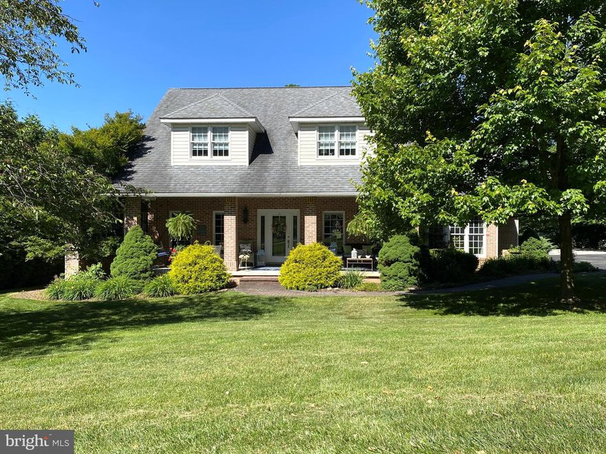 Luxurious and immaculate, this 5 bedroom, 3.5 bathroom home of over 3,900 finished square feet, rests on a tree-shaded lot of just under .75 acres.  The interior of this home is warm and inviting, with an open floor plan upon entering the front door, gleaming hardwood floors, and spacious rooms throughout.  Richly-appointed spaces include large gathering areas, a spectacular dining room, second floor guest suite and a first floor Owner's Suite.  The ensuite, with garden tub, separate tile shower, and separate make-up counter, make this entire room an owner's retreat.  The beautiful kitchen is the heart of the home, complete with granite counters, stainless steel appliances, walk-in pantry, and adjacent breakfast nook that looks out to the meticulously landscaped front yard.  Enjoy the high ceilings, ample storage space and lots of natural light throughout.  Located in the desirable Sand Spring Run development, you are conveniently located to the University, stores, restaurants, Interstate 68, and only 30 minutes from Deep Creek Lake.  You can also relax on the covered front porch and back patio both morning and night, so bring your coffee and wine, and make this house your home.