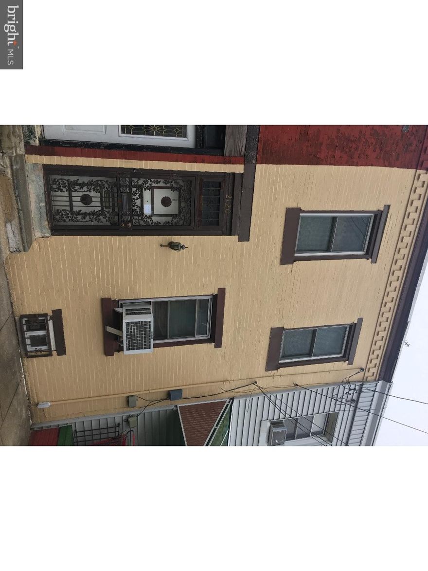 A cute starter home or a great investment! Great location for a rental with good income potential. Just paint and carpet and you can be on your way to being an investor. Living room and dining are good sized. There is a very large kitchen with newer upper cabinets. Outside exit to rear yard. Upstairs features 2 bedrooms and a bathroom with footed tub. Nice sized basement with New Heat and Water Heater.The windows have been replaced and the home is great overall condition with some cosmetic improvements needed. Roof was done in 2003 and coated thereafter every 3-4 years. Roll up your sleeves and enjoy the potential for sweat equity! Conveniently located to shopping, public transportation, schools and a quick commute to Center City. Cash offers only please.