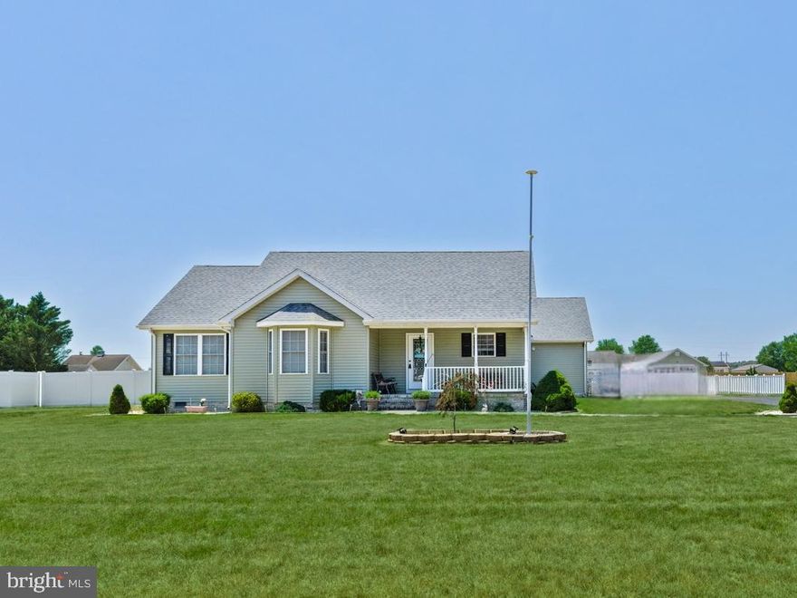 Welcome to this spacious single-family rancher offering an open-concept layout designed for comfortable everyday living and entertaining. Featuring cathedral ceilings, decorative beam accents, recessed lighting, and a flowing floor plan, the main living areas seamlessly connect the family room, dining area, and kitchen.
The kitchen offers ample counter space, a tiled backsplash, white cabinetry with nickel hardware, a breakfast nook, and a mix of black and stainless steel appliances. Adjacent dining and laundry areas provide additional pantry and storage space for added convenience.
Privately located at the rear of the home, the primary suite features high ceilings, recessed lighting, a walk-in closet, and an en suite bath with a soaking Jacuzzi tub, separate shower, dual sinks, water closet, and a linen closet. Two additional bedrooms and a full hall bath provide comfortable accommodations for family or guests.
Additional highlights include an attached side-load two-car garage with a mini-split system, a detached one-car garage, a tankless hot water heater, a generator, solar panels (ownership/lease to be confirmed), and pull-down attic access.
Step outside to enjoy the fully fenced rear yard complete with a covered Trex porch and gazebo, stone patio, semi-inground/above-ground pool, storage shed, solar panels, and plenty of space for outdoor entertaining and relaxation. 
Located in Laurel, Delaware, a  rural town in western Sussex County known for its small-town charm, agricultural surroundings, and relaxed lifestyle. Laurel offers a peaceful setting while still providing convenient access to everyday amenities in nearby Seaford and Georgetown, as well as larger commercial hubs like Salisbury, Maryland. Residents also enjoy an easy drive to the Delaware and Maryland beaches, including Rehoboth Beach, Bethany Beach, and Ocean City, making it ideal for both year-round living and seasonal recreation.  Schedule your showing today!